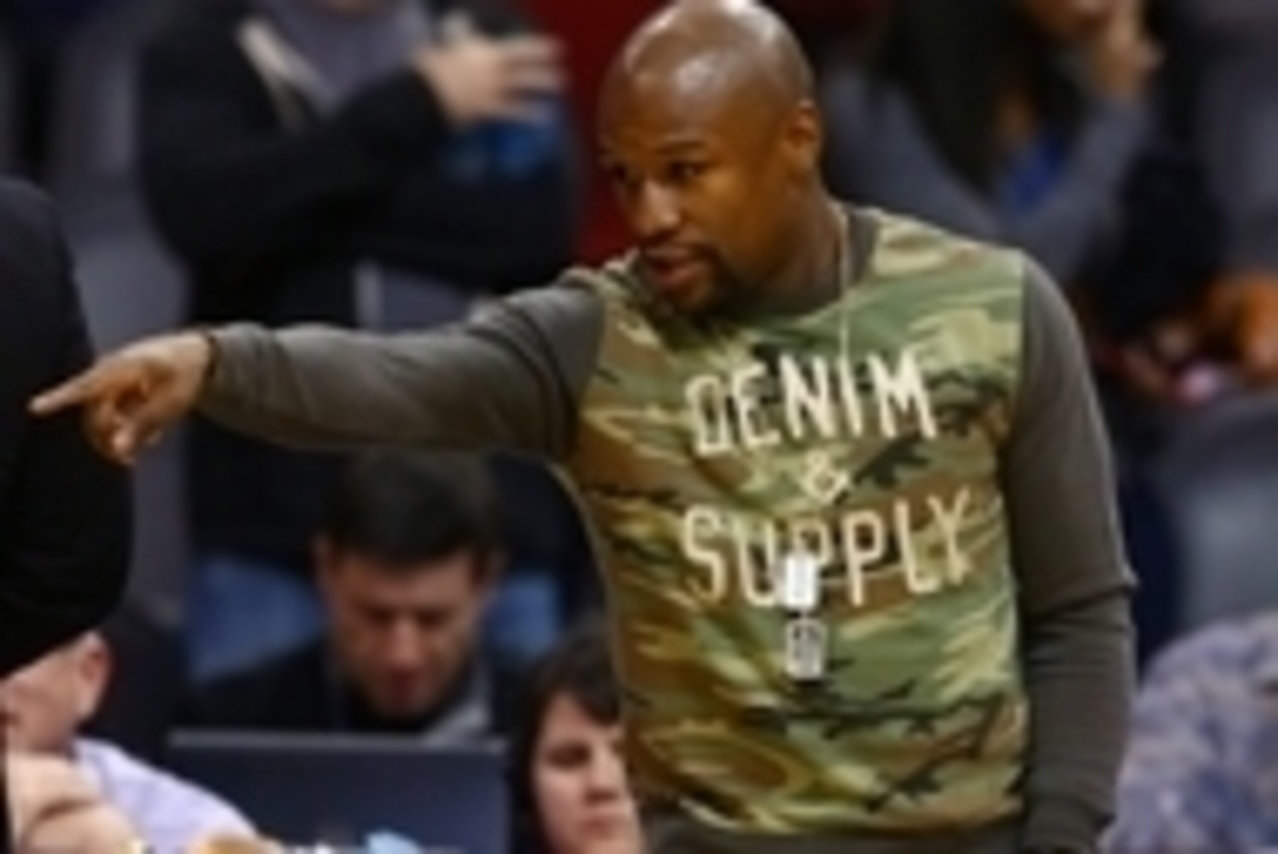 Jan 19, 2015; Phoenix, AZ, USA; Professional boxer Floyd Mayweather sits courtside during the game between the Phoenix Suns against the Los Angeles Lakers at US Airways Center. Mandatory Credit: Mark J. Rebilas-USA TODAY Sports