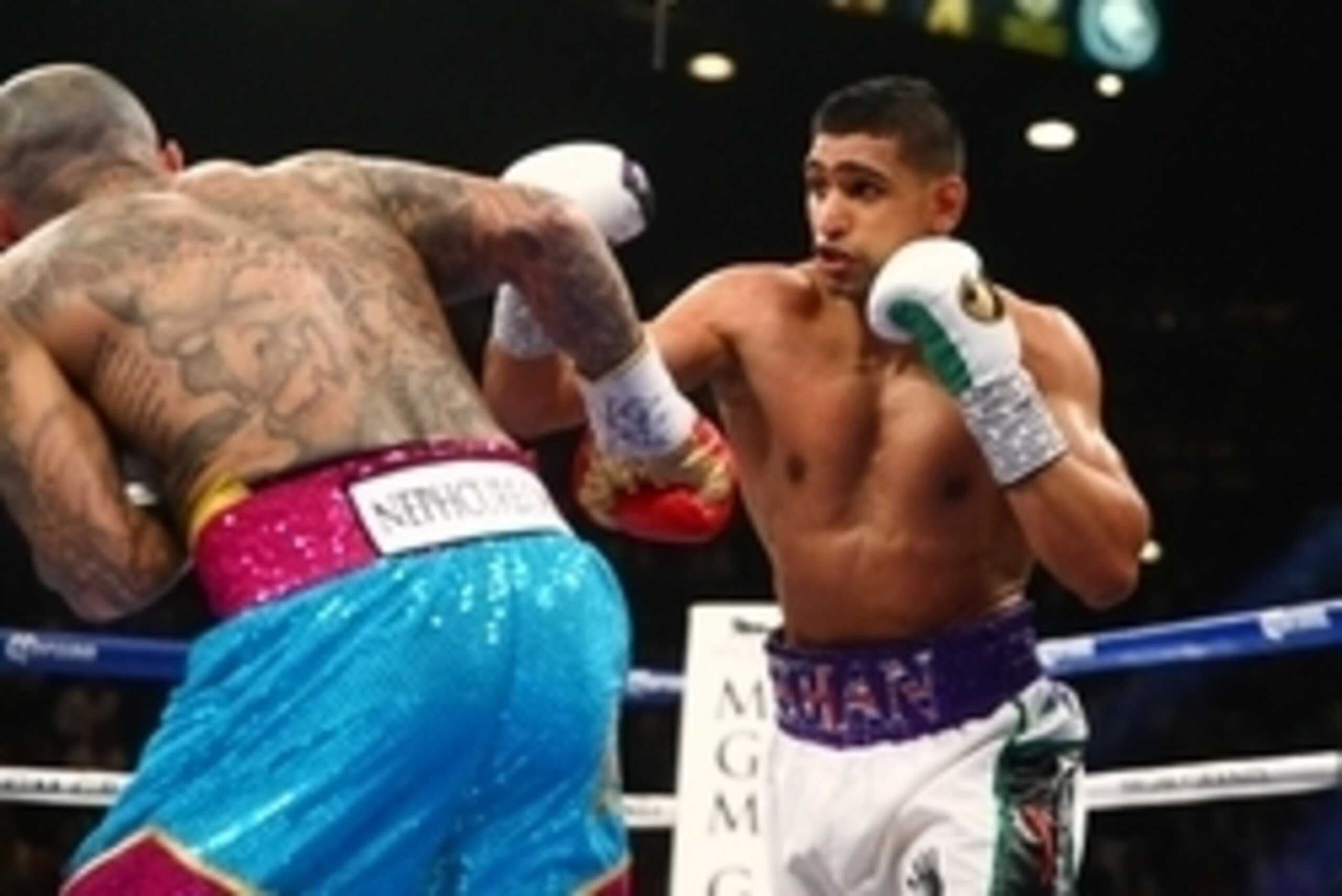 May 3, 2014; Las Vegas, NV, USA; Amir Khan (right) against Luis Collazo during their fight at MGM Grand. Mandatory Credit: Mark J. Rebilas-USA TODAY Sports