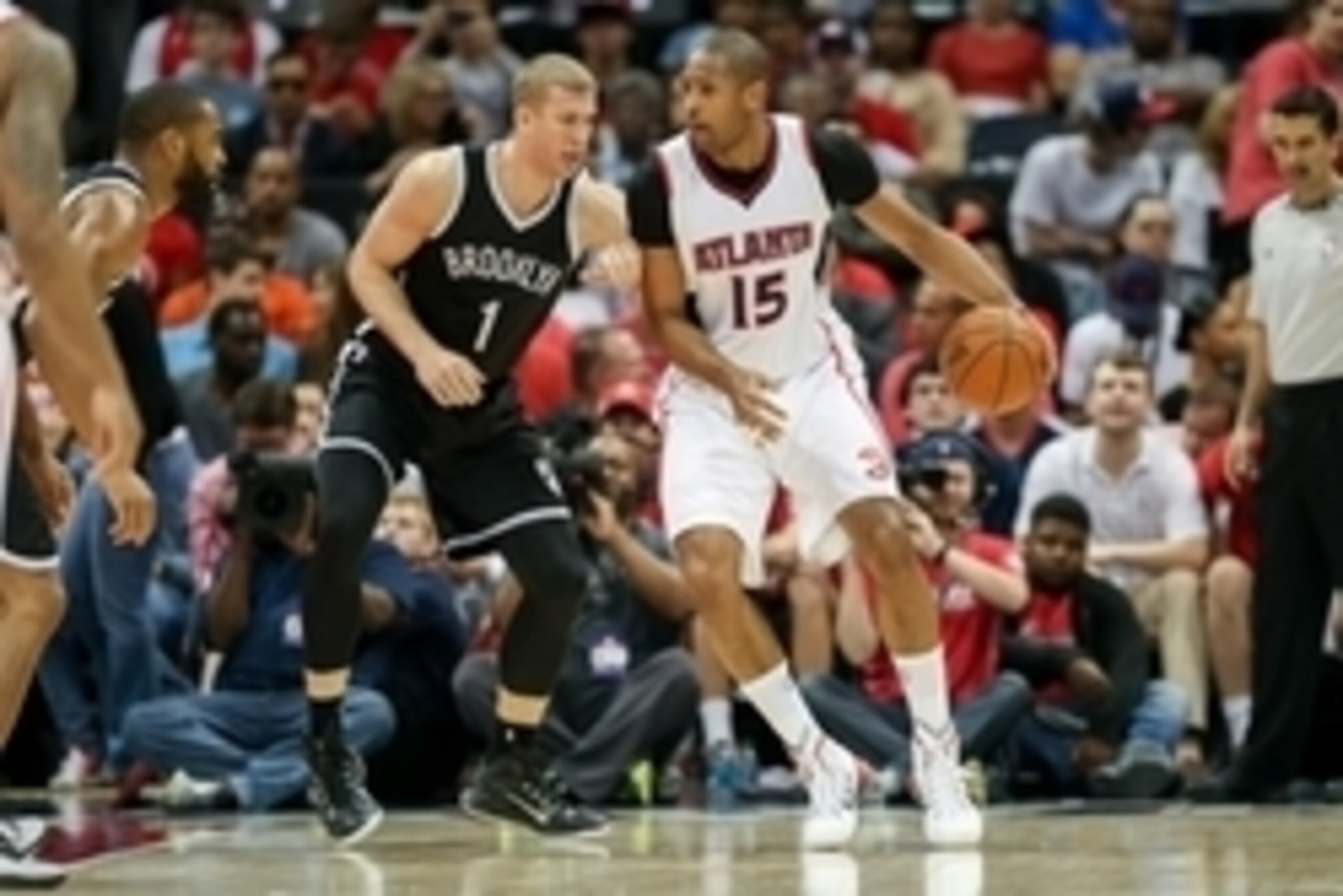 Apr 22, 2015; Atlanta, GA, USA; Brooklyn Nets center Mason Plumlee (1) defends Atlanta Hawks center Al Horford (15) during the second quarter of game two of the first round of the NBA Playoffs at Philips Arena. Mandatory Credit: Kevin Liles-USA TODAY Spor