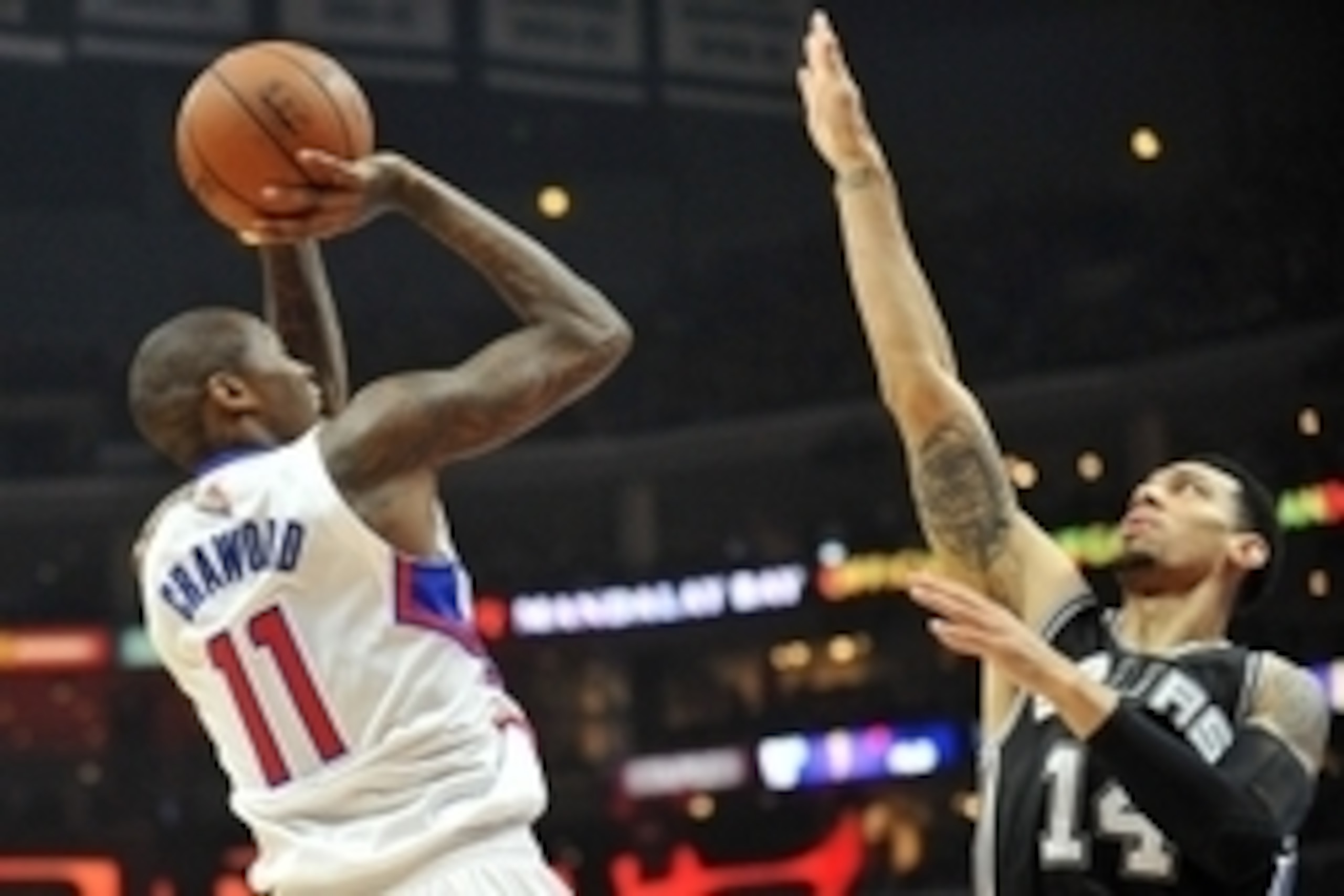 April 22, 2015; Los Angeles, CA, USA; Los Angeles Clippers guard Jamal Crawford (11) shoots against the defense of San Antonio Spurs guard Danny Green (14) during the first half in game two of the first round of the NBA Playoffs. at Staples Center. Mandat