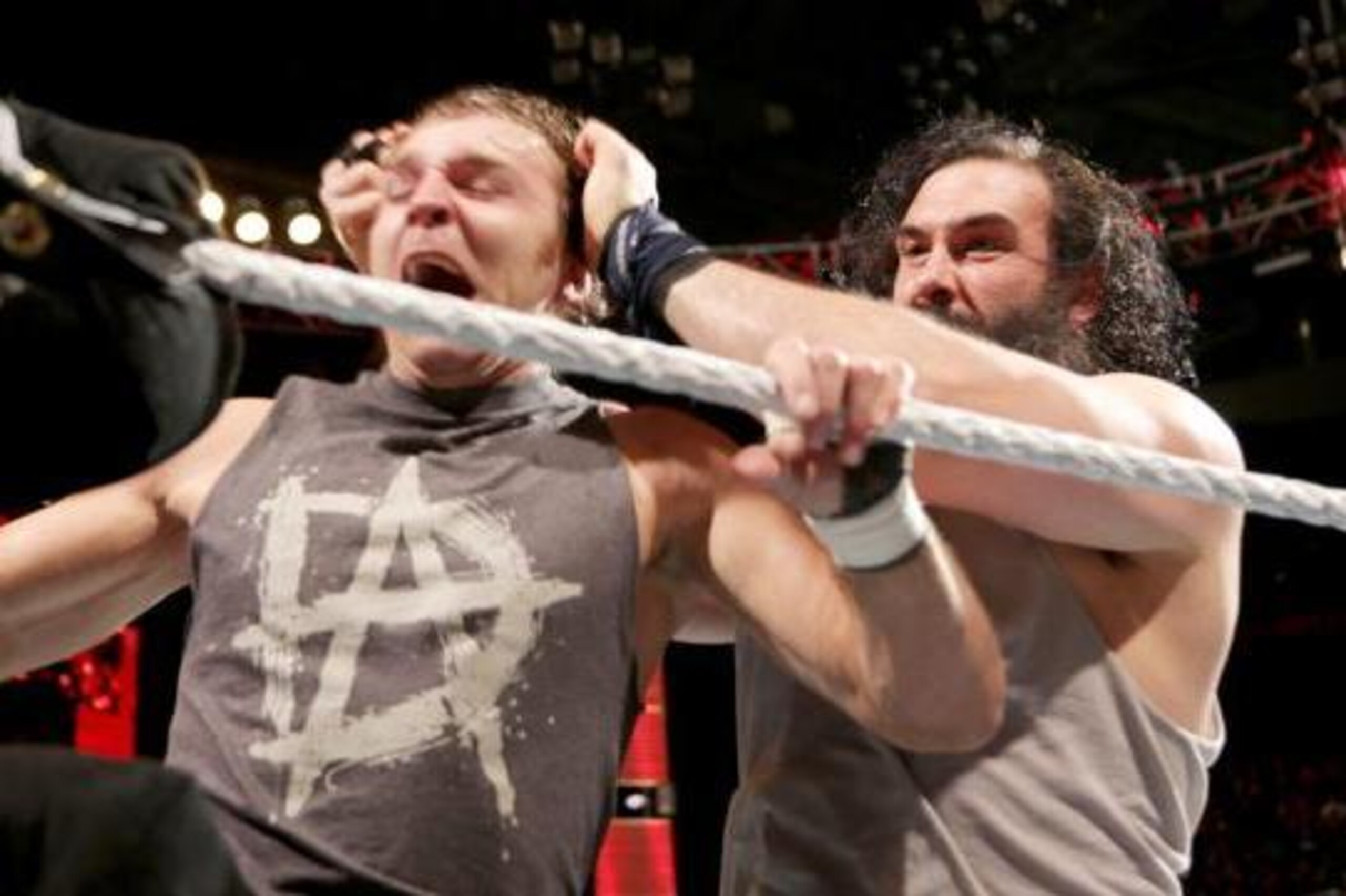 Luke Harper attacks Dean Ambrose. Luke Harper attacks Dean Ambrose.