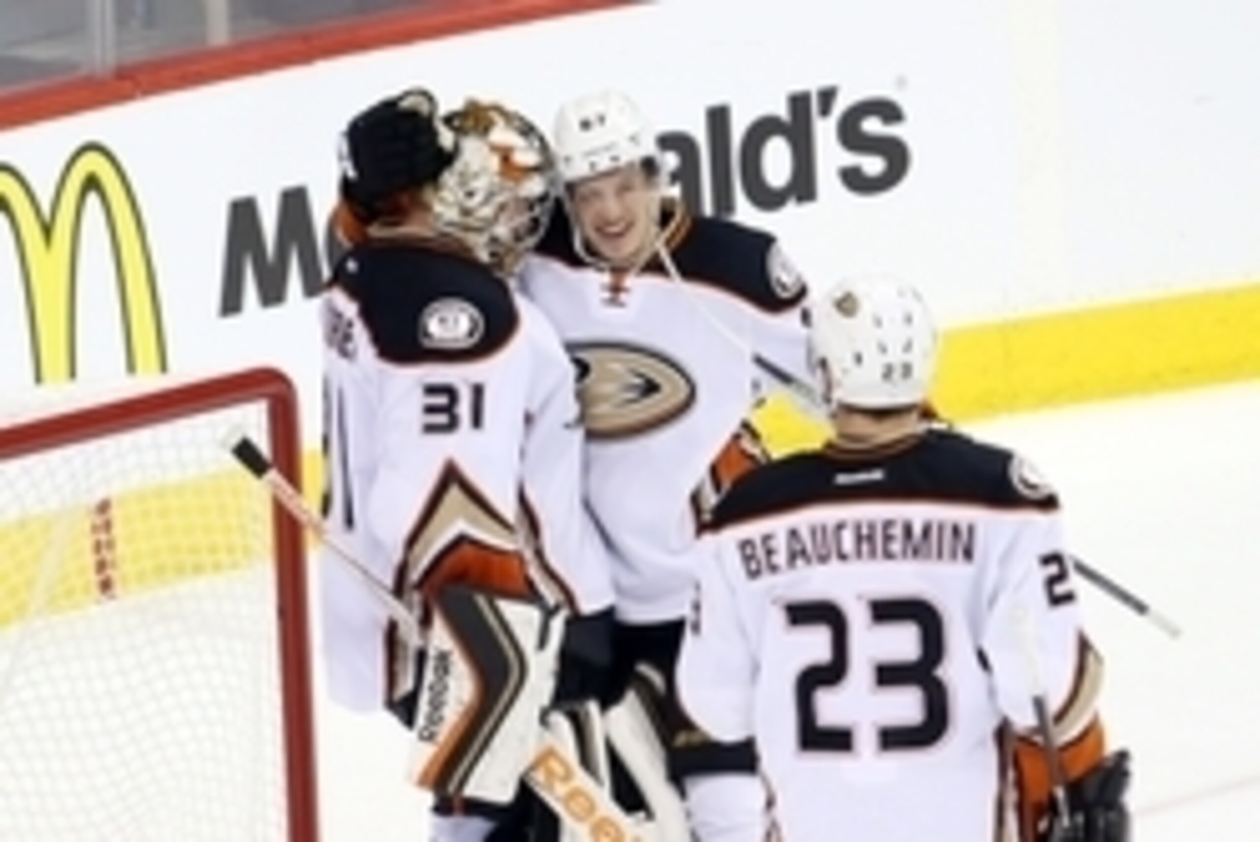 Apr 22, 2015; Winnipeg, Manitoba, CAN; Anaheim Ducks center Rickard Rakell (67) celebrates with goalie Frederik Andersen (31) after the third period in game four of the first round of the 2015 Stanley Cup Playoffs against the Winnipeg Jets at MTS Centre. 