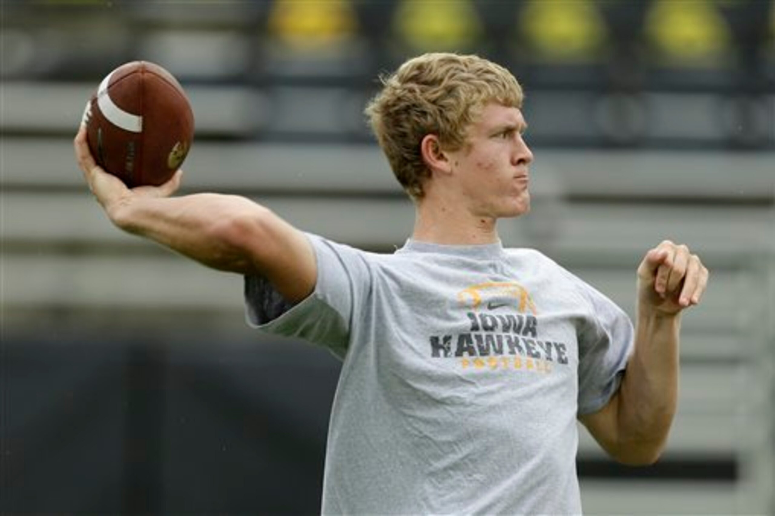 Jake Rudock warms up before a game in 2013.