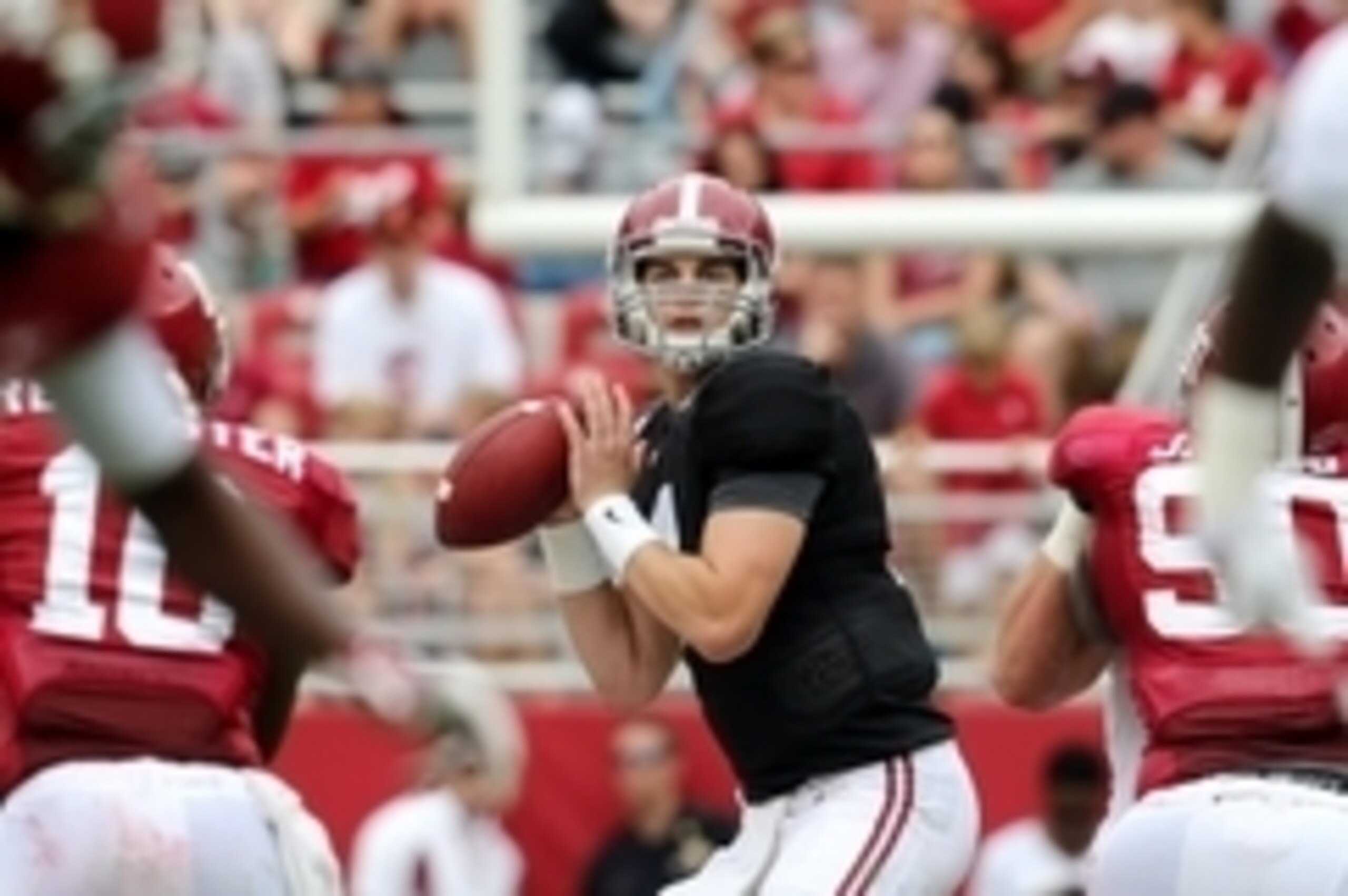 Apr 18, 2015; Tuscaloosa, AL, USA; Alabama Crimson Tide quarterback Jake Coker (14) drops back to pass against the crimson team during the annual A-day game at Bryant Denny Stadium. Mandatory Credit: Marvin Gentry-USA TODAY Sports
