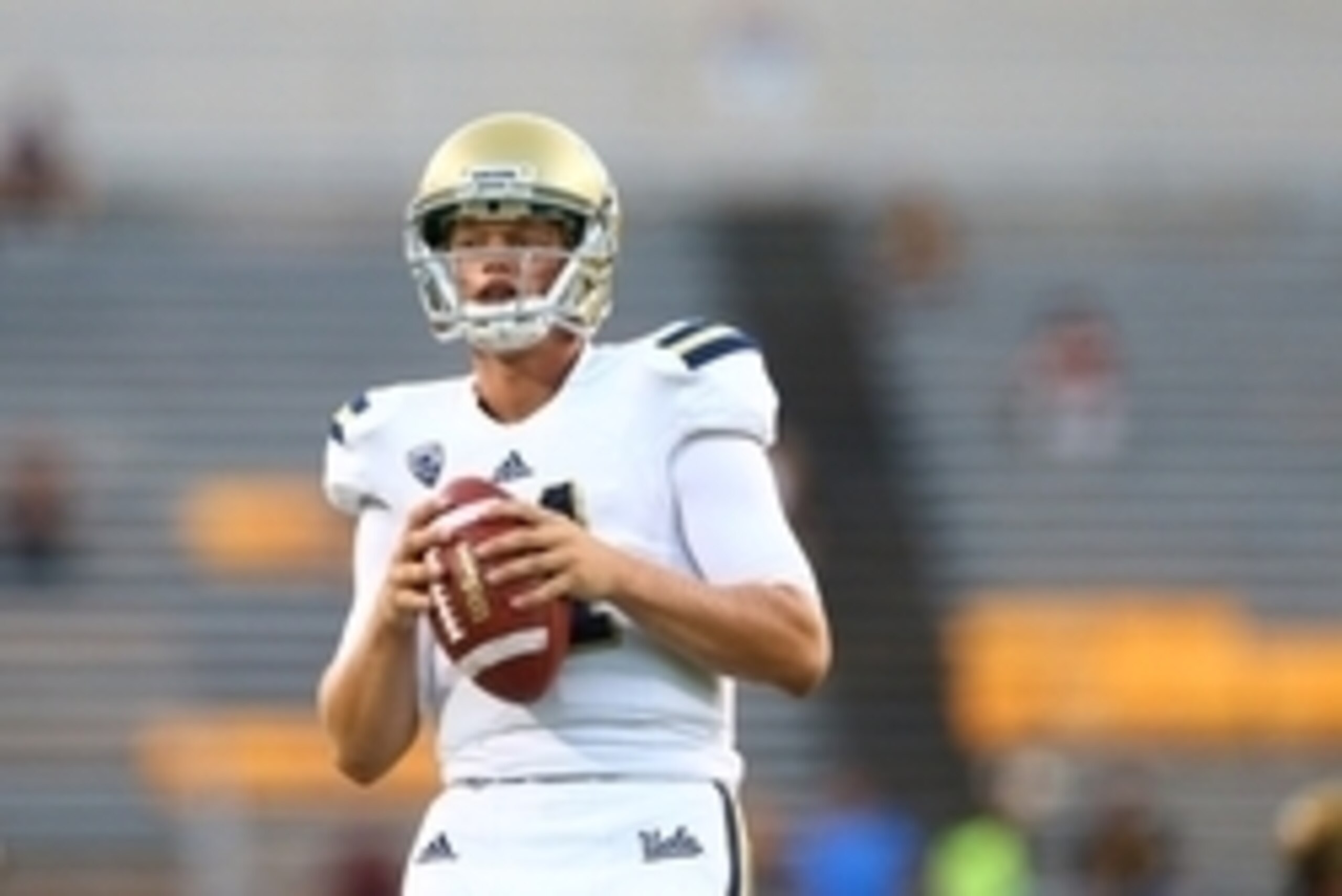 Sep 25, 2014; Tempe, AZ, USA; UCLA Bruins quarterback Jerry Neuheisel (11) against the Arizona State Sun Devils at Sun Devil Stadium. Mandatory Credit: Mark J. Rebilas-USA TODAY Sports