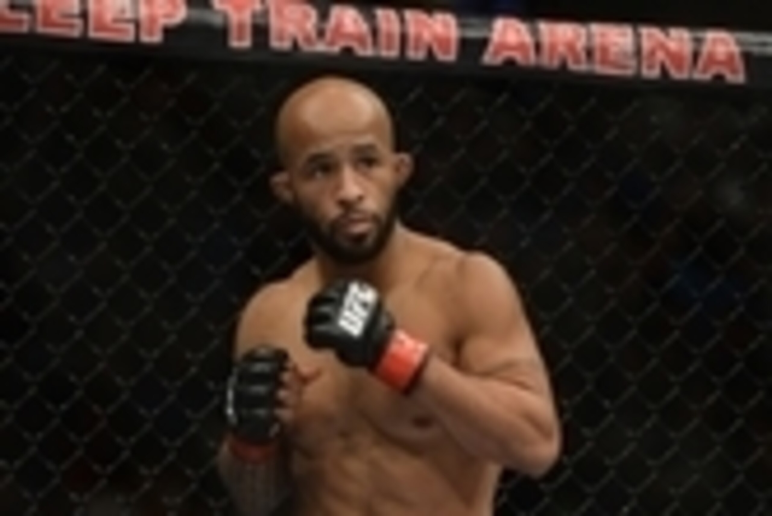 December 14, 2013; Sacramento, CA, USA; Demetrious Johnson (red gloves) fights Joseph Benavidez (blue gloves) during the flyweight championship bout of the UFC on FOX 9 at Sleep Train Arena. Johnson defeated Benavidez. Mandatory Credit: Kyle Terada-USA TO