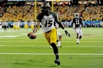 Dec 7, 2013; Atlanta, GA, USA; Missouri Tigers wide receiver Dorial Green-Beckham (15) runs a touchdown past Auburn Tigers cornerback Chris Davis (11) during the second quarter of the 2013 SEC Championship game at Georgia Dome. Mandatory Credit: Kevin Lil