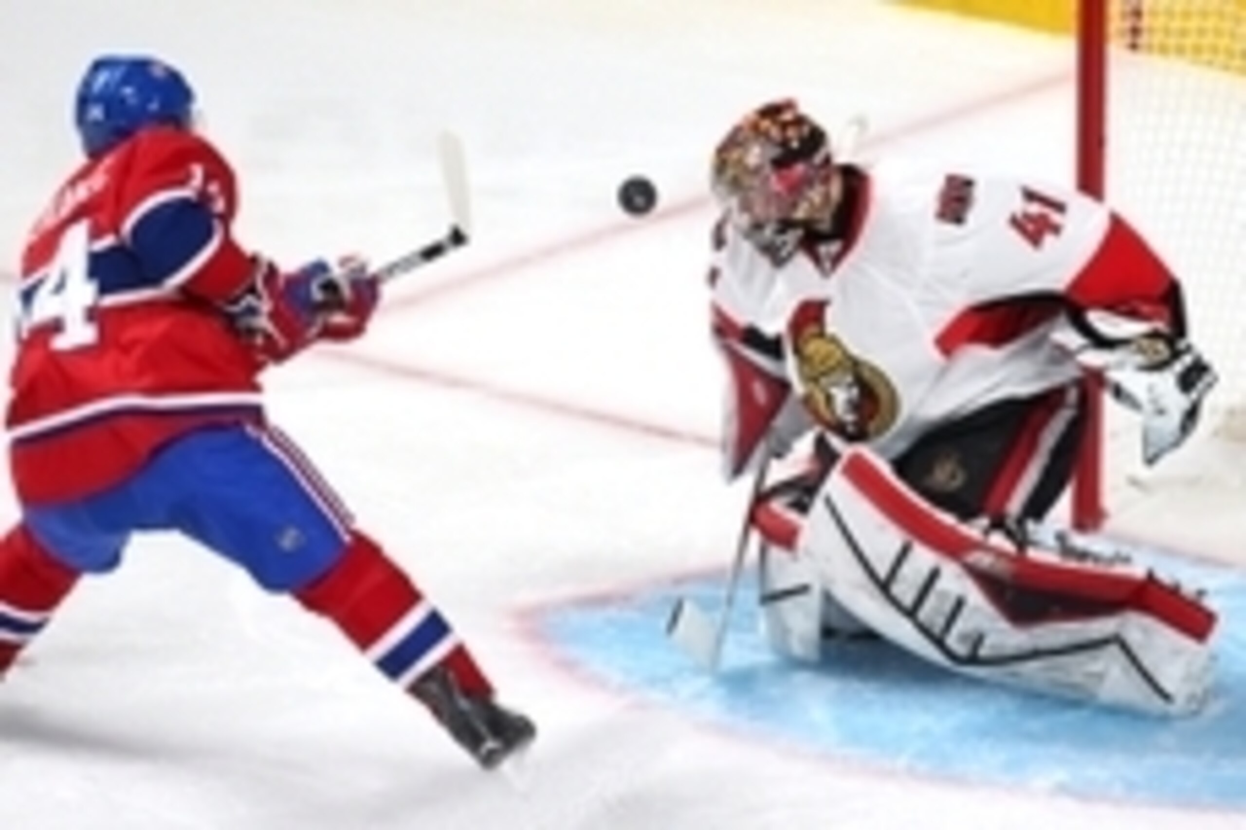 Apr 24, 2015; Montreal, Quebec, CAN; Montreal Canadiens center Tomas Plekanec (14) shoots on Ottawa Senators goalie Craig Anderson (41) during the second period in game five of the first round of the 2015 Stanley Cup Playoffs at Bell Centre. Mandatory Cre