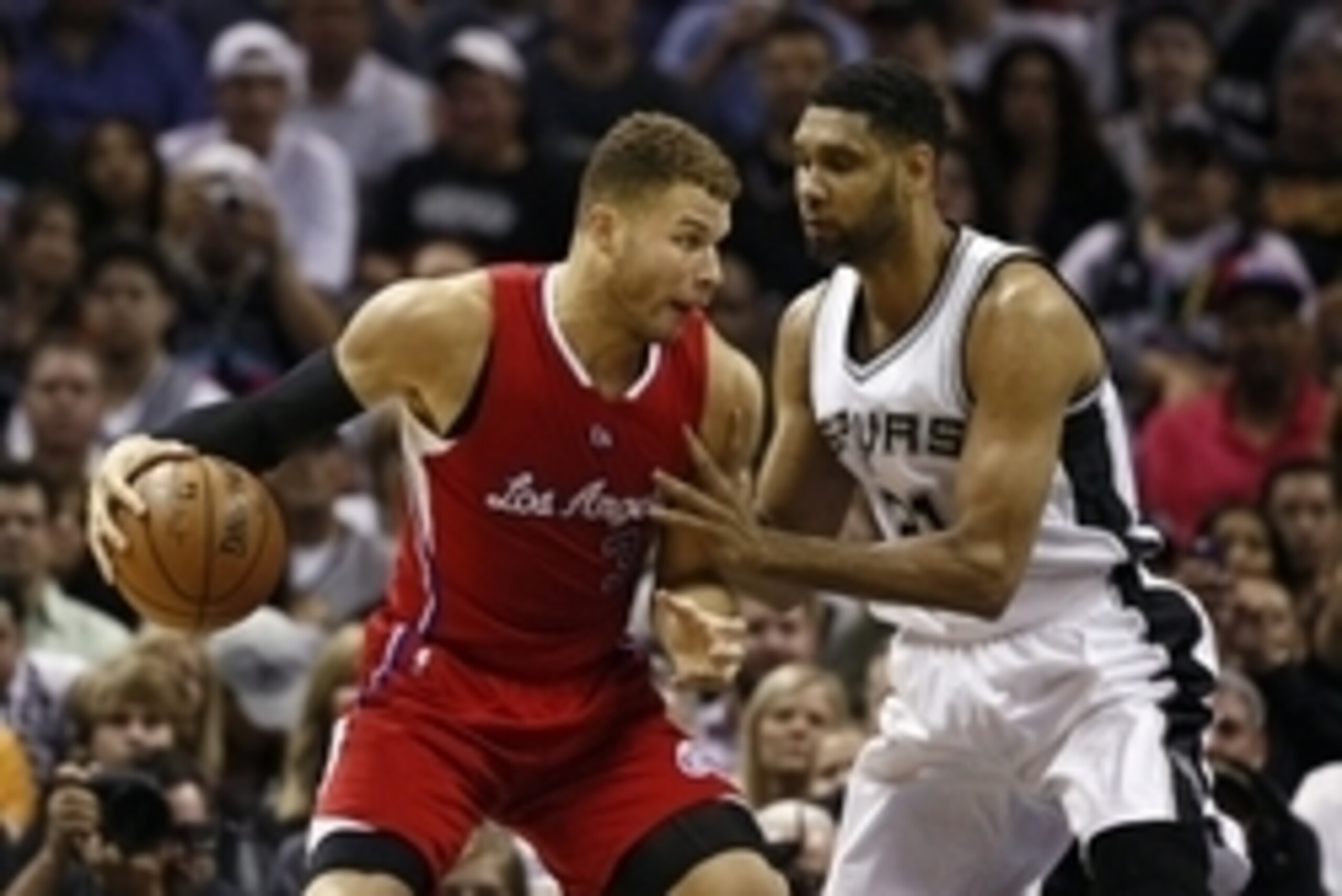 Apr 24, 2015; San Antonio, TX, USA; Los Angeles Clippers power forward Blake Griffin (L) is defended by San Antonio Spurs power forward Tim Duncan (R) in game three of the first round of the NBA Playoffs at AT&T Center. Mandatory Credit: Soobum Im-USA TOD