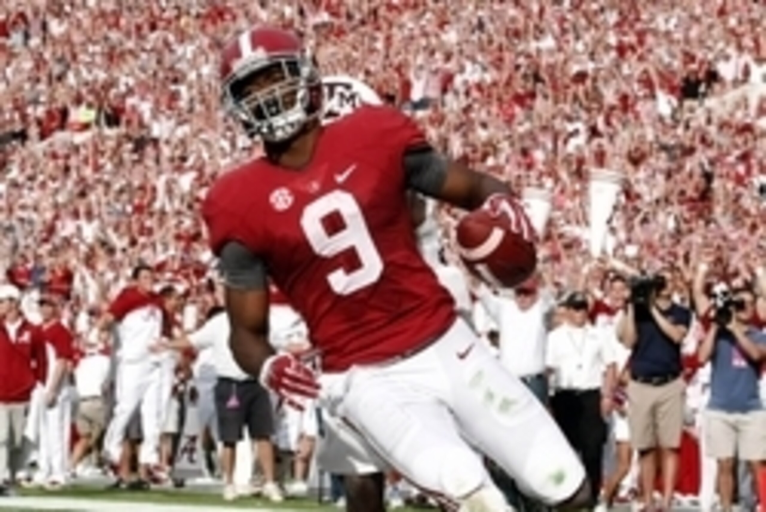Oct 18, 2014; Tuscaloosa, AL, USA; Alabama Crimson Tide wide receiver Amari Cooper (9) catches a pass for a touchdown against the Texas A&M Aggies at Bryant-Denny Stadium. Mandatory Credit: Marvin Gentry-USA TODAY Sports