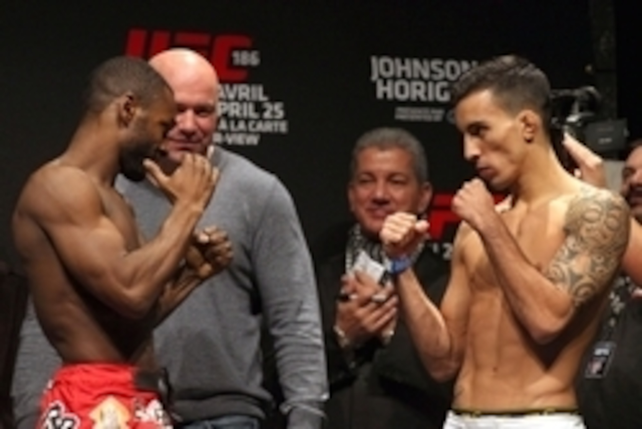 Apr 24, 2015; Montreal, Quebec, CAN; Yves Jabouin and Thomas Almeida pose during weigh-ins for UFC 186 at Metropolis. Mandatory Credit: Jean-Yves Ahern-USA TODAY Sports