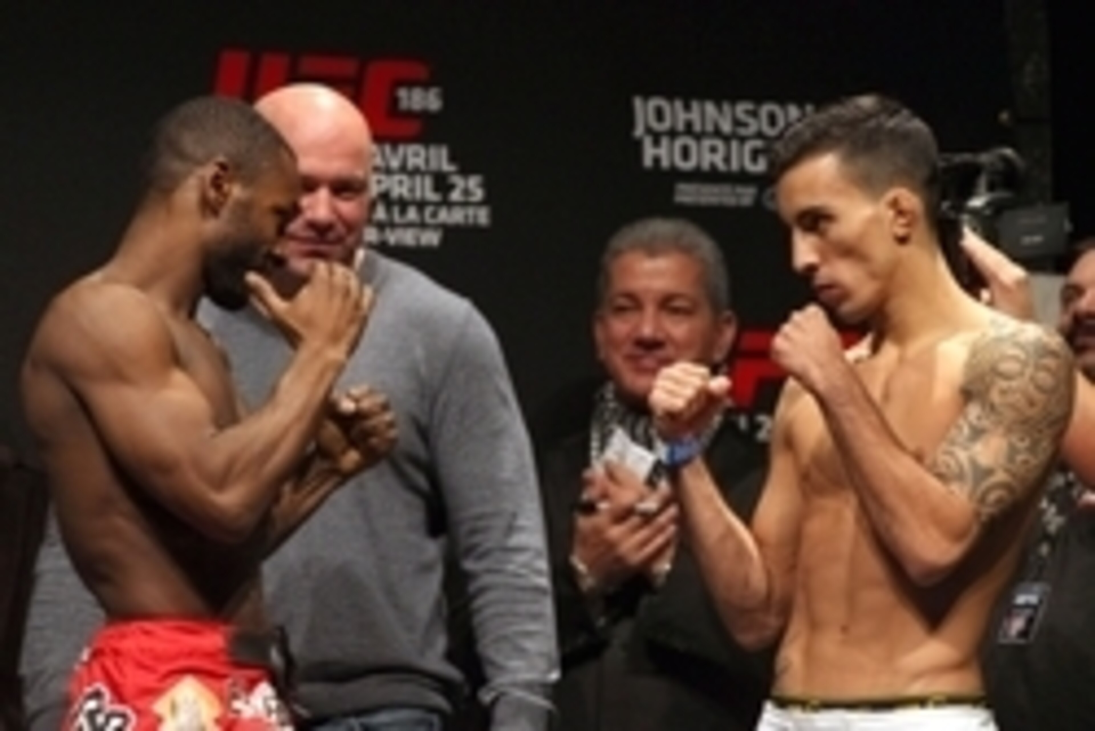 Apr 24, 2015; Montreal, Quebec, CAN; Yves Jabouin and Thomas Almeida pose during weigh-ins for UFC 186 at Metropolis. Mandatory Credit: Jean-Yves Ahern-USA TODAY Sports