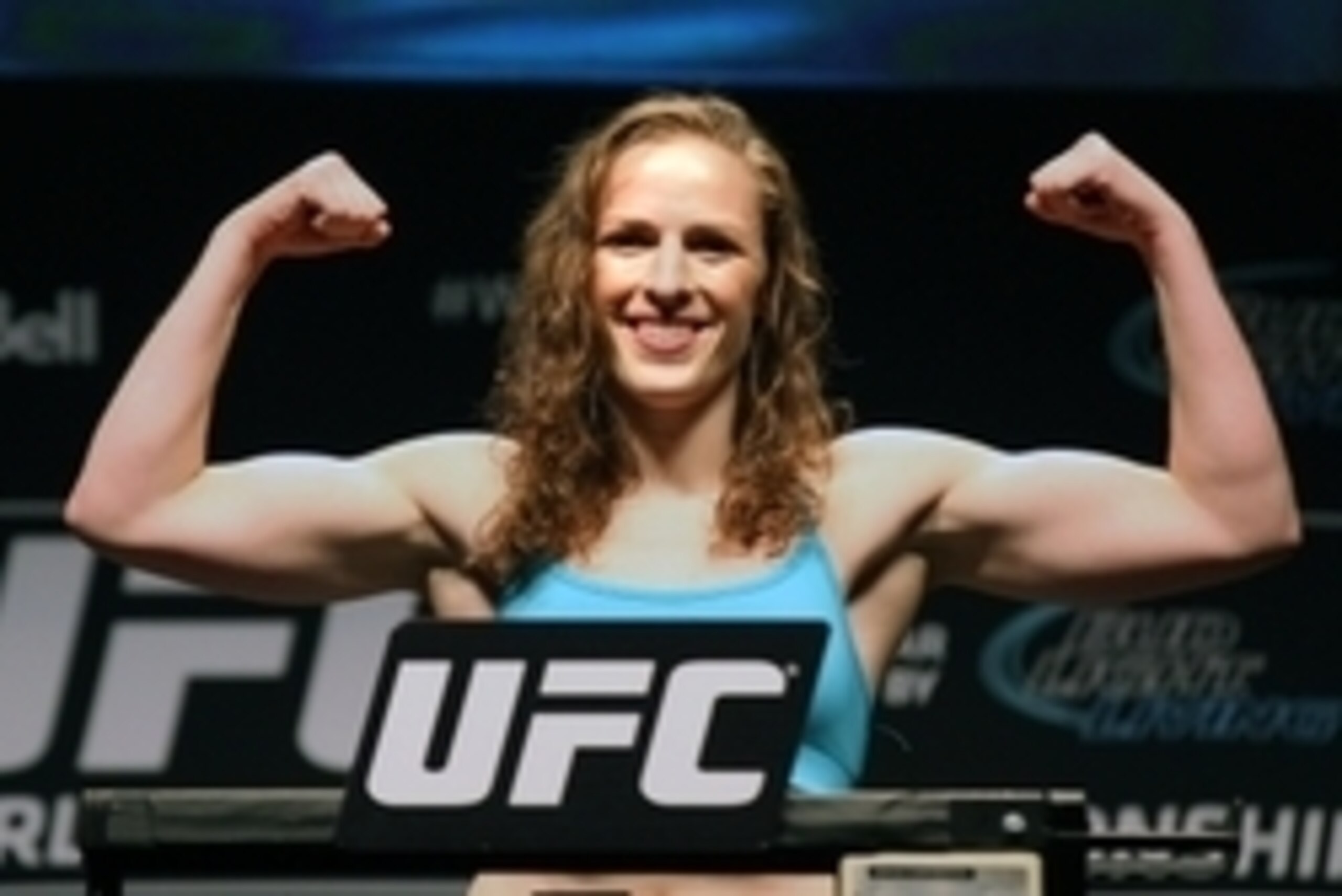 Apr 24, 2015; Montreal, Quebec, CAN; Sarah Kaufman stands on the scale during weigh-ins for UFC 186 at Metropolis. Mandatory Credit: Jean-Yves Ahern-USA TODAY Sports