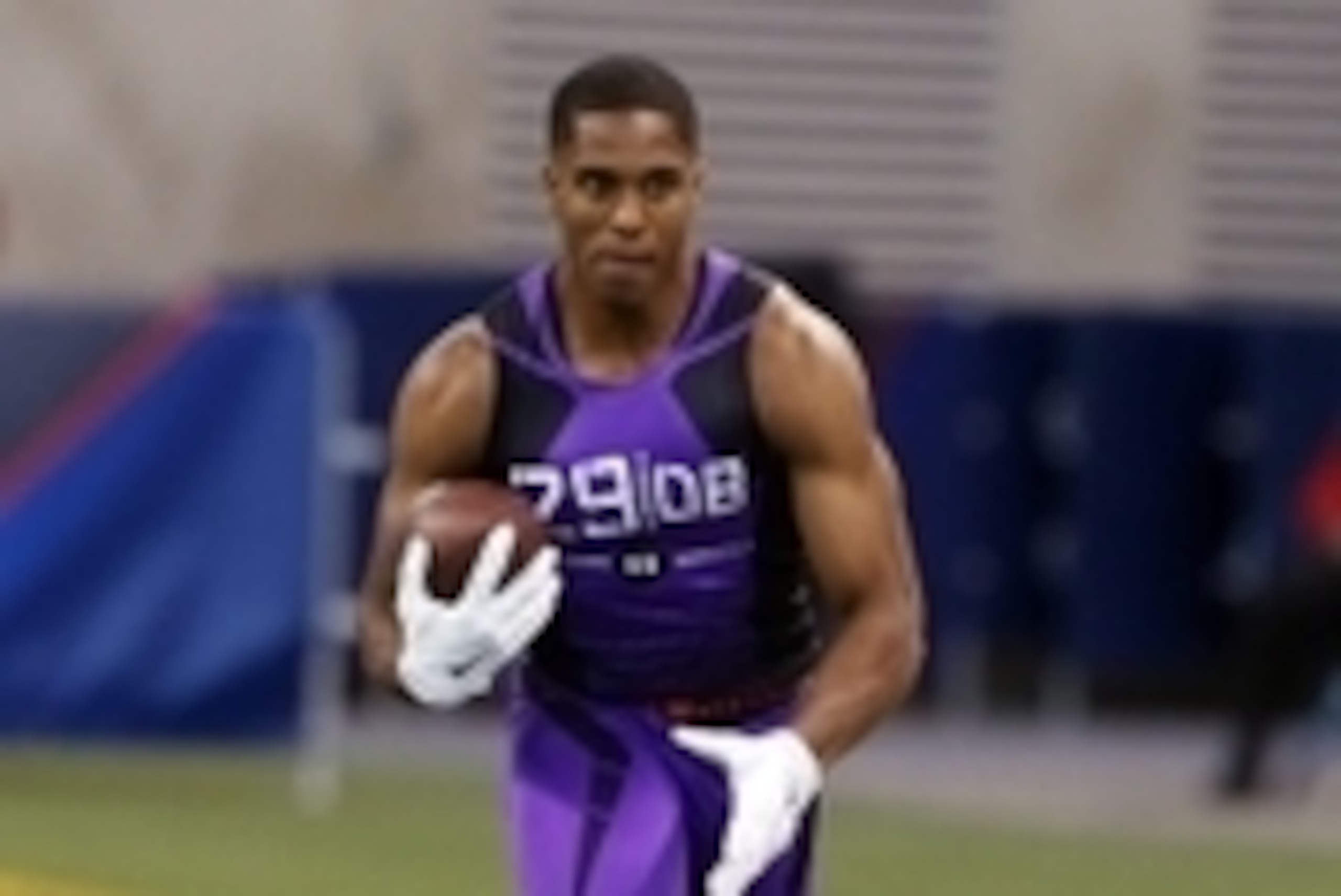 Feb 23, 2015; Indianapolis, IN, USA; Connecticut Huskies defensive back Byron Jones runs with the ball in a workout drill during the 2015 NFL Combine at Lucas Oil Stadium. Mandatory Credit: Brian Spurlock-USA TODAY Sports