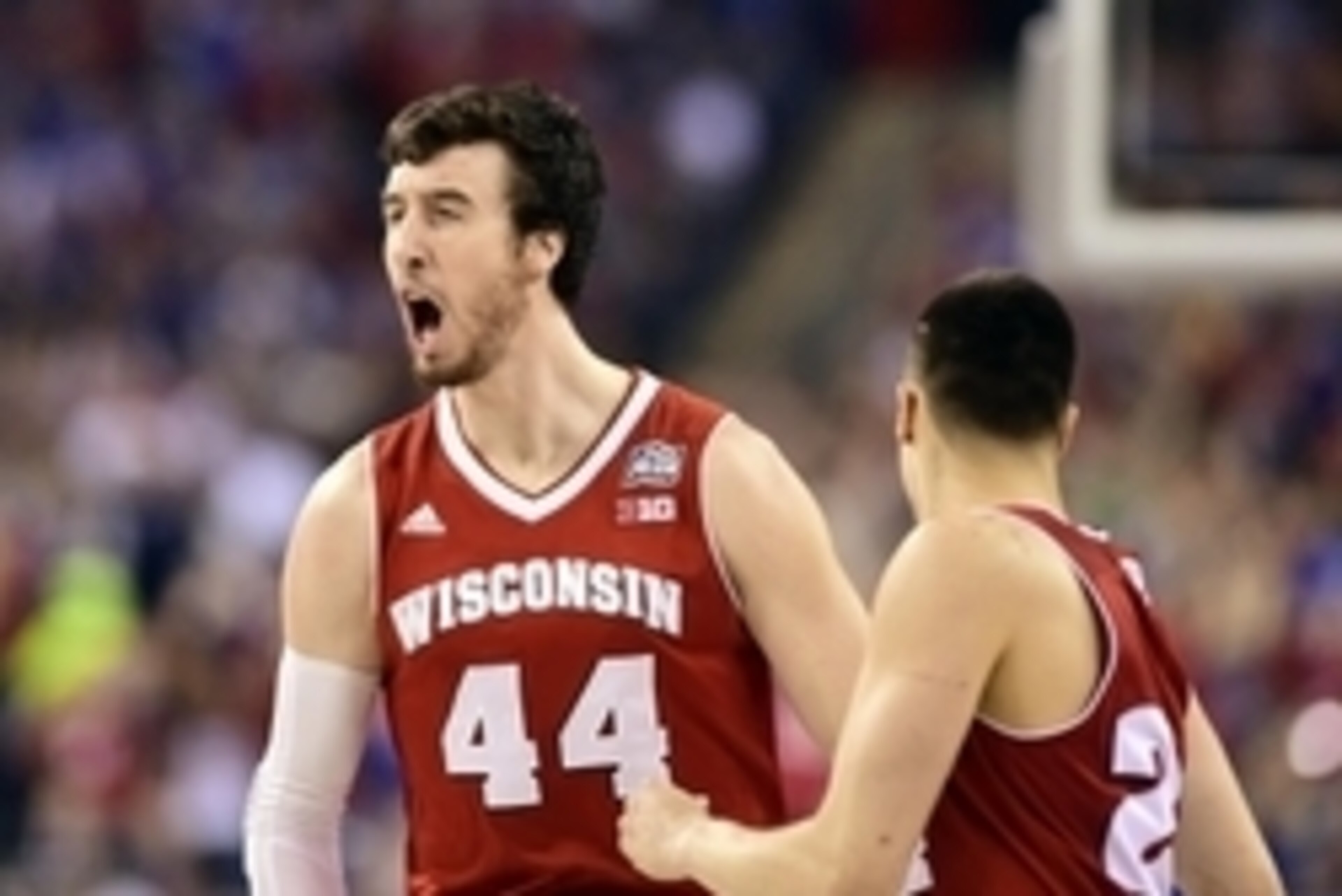 Apr 6, 2015; Indianapolis, IN, USA; Wisconsin Badgers forward Frank Kaminsky (44) reacts after a basket against the Duke Blue Devils in the first half in the 2015 NCAA Men's Division I Championship game at Lucas Oil Stadium. Mandatory Credit: Bob Donnan-U