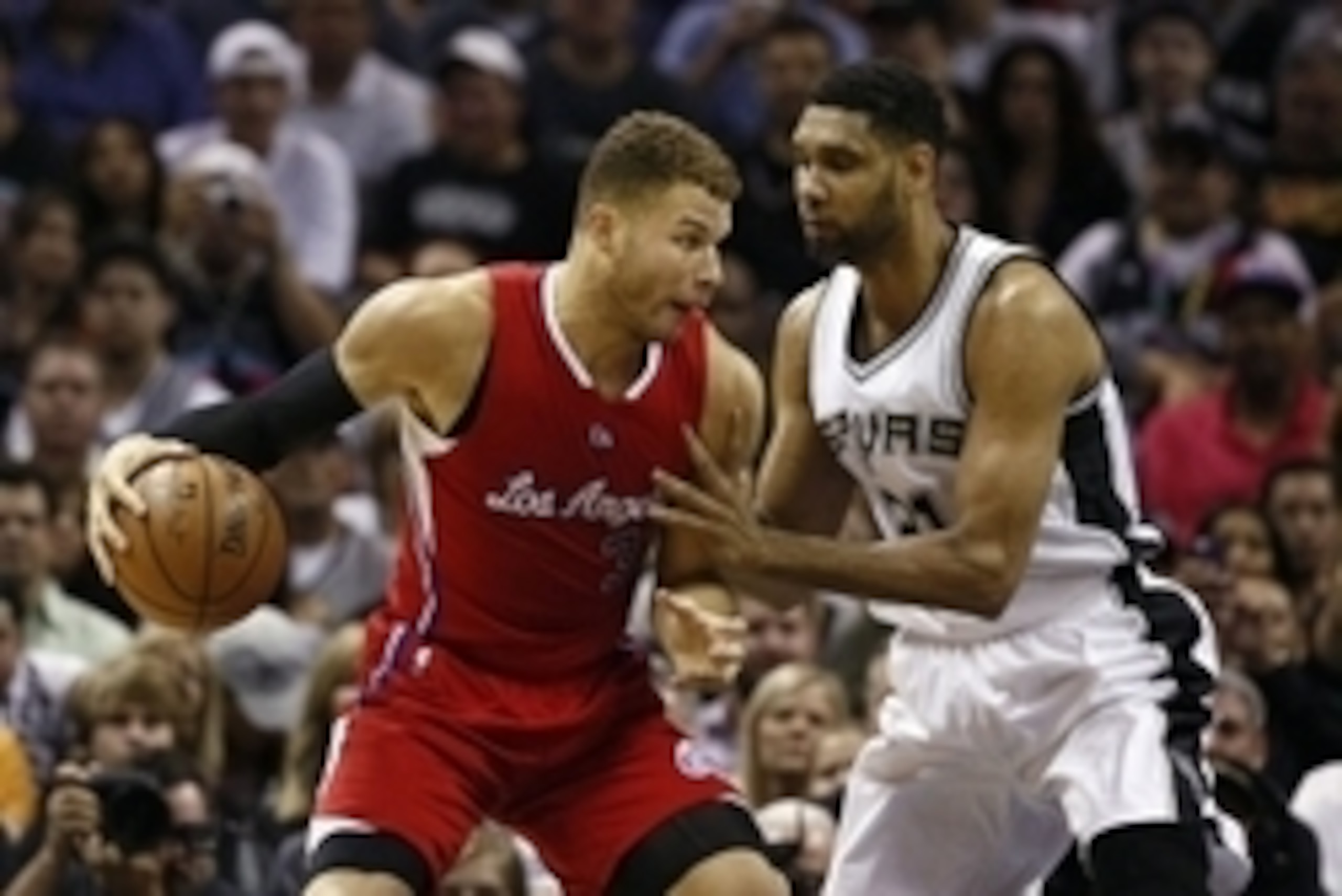 Apr 24, 2015; San Antonio, TX, USA; Los Angeles Clippers power forward Blake Griffin (L) is defended by San Antonio Spurs power forward Tim Duncan (R) in game three of the first round of the NBA Playoffs at AT&T Center. Mandatory Credit: Soobum Im-USA TOD