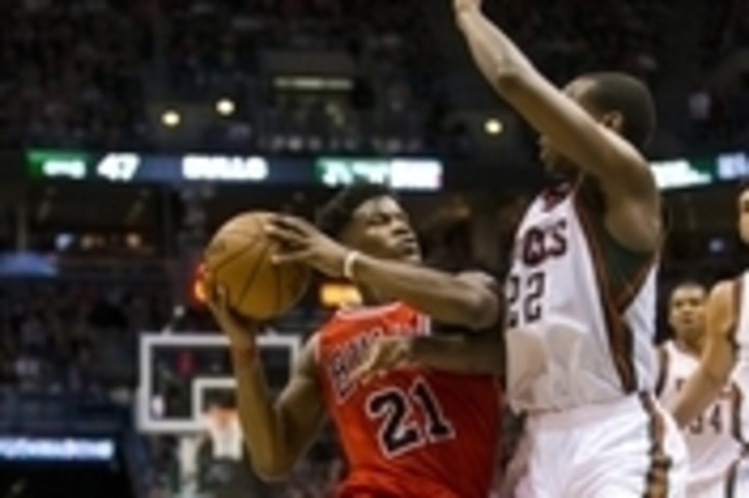 Apr 23, 2015; Milwaukee, WI, USA; Chicago Bulls guard Jimmy Butler (21) drives for the basket as Milwaukee Bucks guard Khris Middleton (22) defends during the second quarter in game three of the first round of the NBA Playoffs at BMO Harris Bradley Center Apr 23, 2015; Milwaukee, WI, USA; Chicago Bulls guard Jimmy Butler (21) drives for the basket as Milwaukee Bucks guard Khris Middleton (22) defends during the second quarter in game three of the first round of the NBA Playoffs at BMO Harris Bradley Center