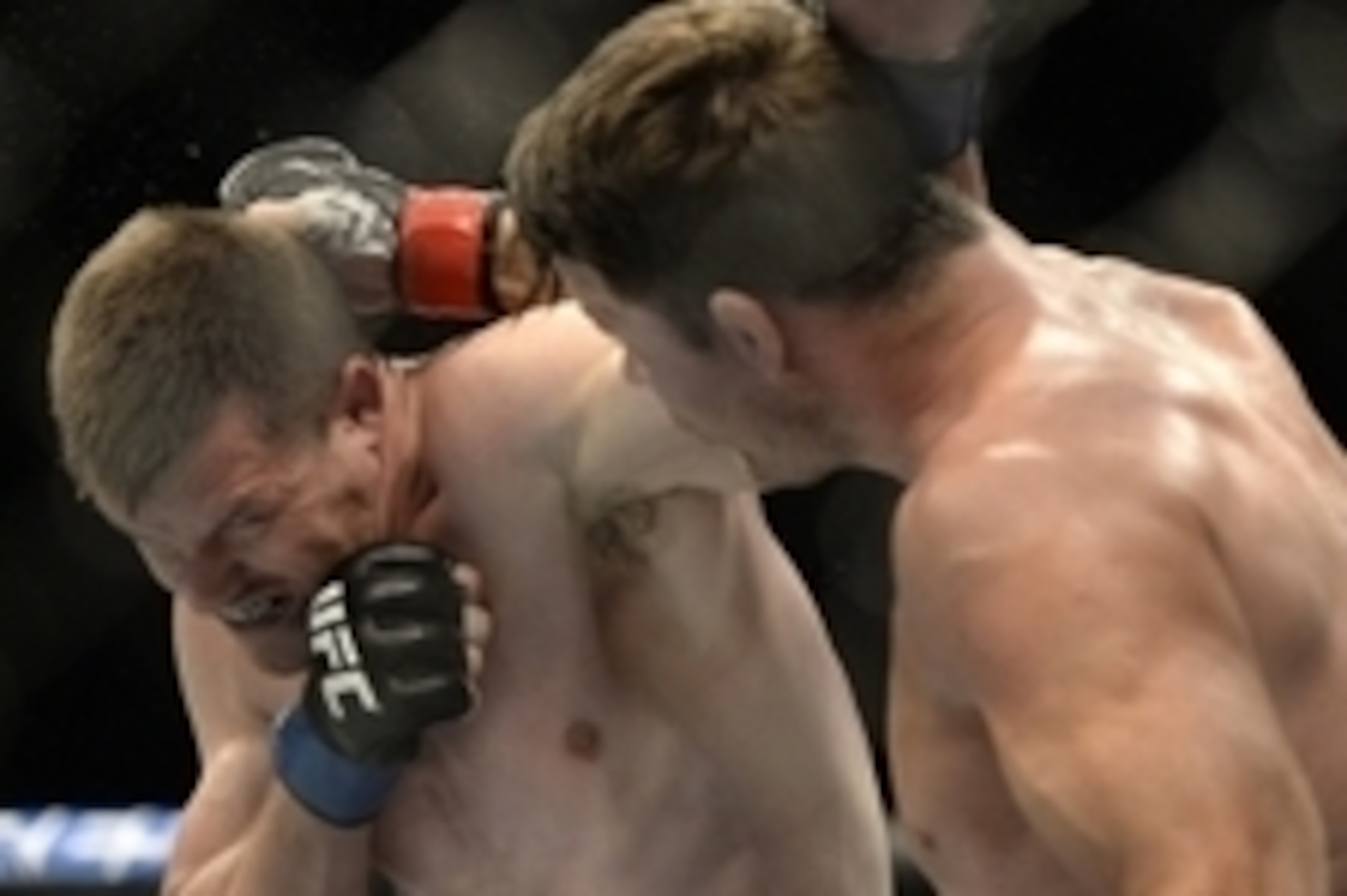 Apr 25, 2015; Montreal, Quebec, CAN; Michael Bisping (red) and CB Dalloway (blue) fight during their middleweight bout during UFC 186 at Bell Centre. Mandatory Credit: Eric Bolte-USA TODAY Sports