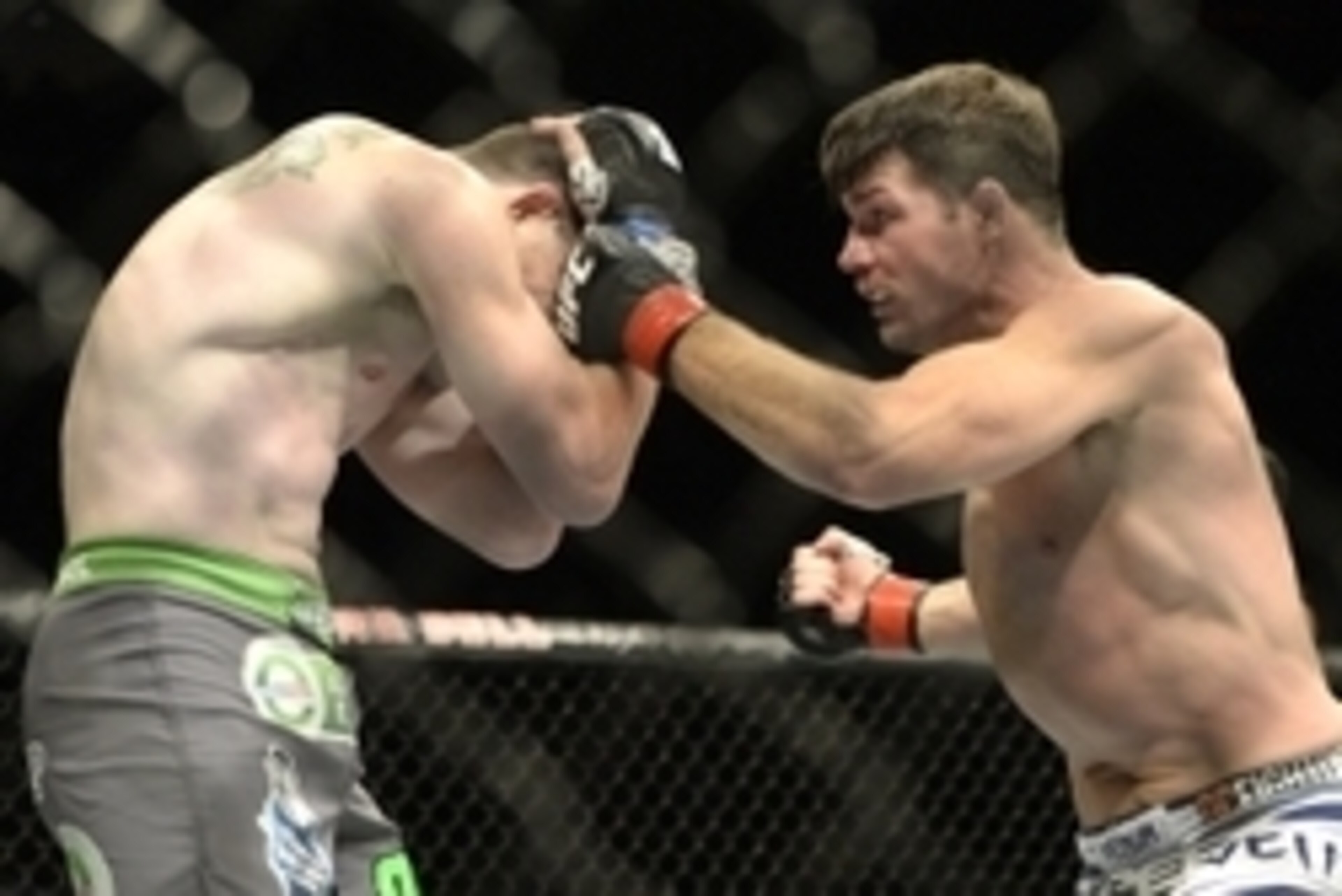 Apr 25, 2015; Montreal, Quebec, CAN; Michael Bisping (red) and CB Dalloway (blue) fight during their middleweight bout during UFC 186 at Bell Centre. Mandatory Credit: Eric Bolte-USA TODAY Sports Apr 25, 2015; Montreal, Quebec, CAN; Michael Bisping (red) and CB Dalloway (blue) fight during their middleweight bout during UFC 186 at Bell Centre. Mandatory Credit: Eric Bolte-USA TODAY Sports
