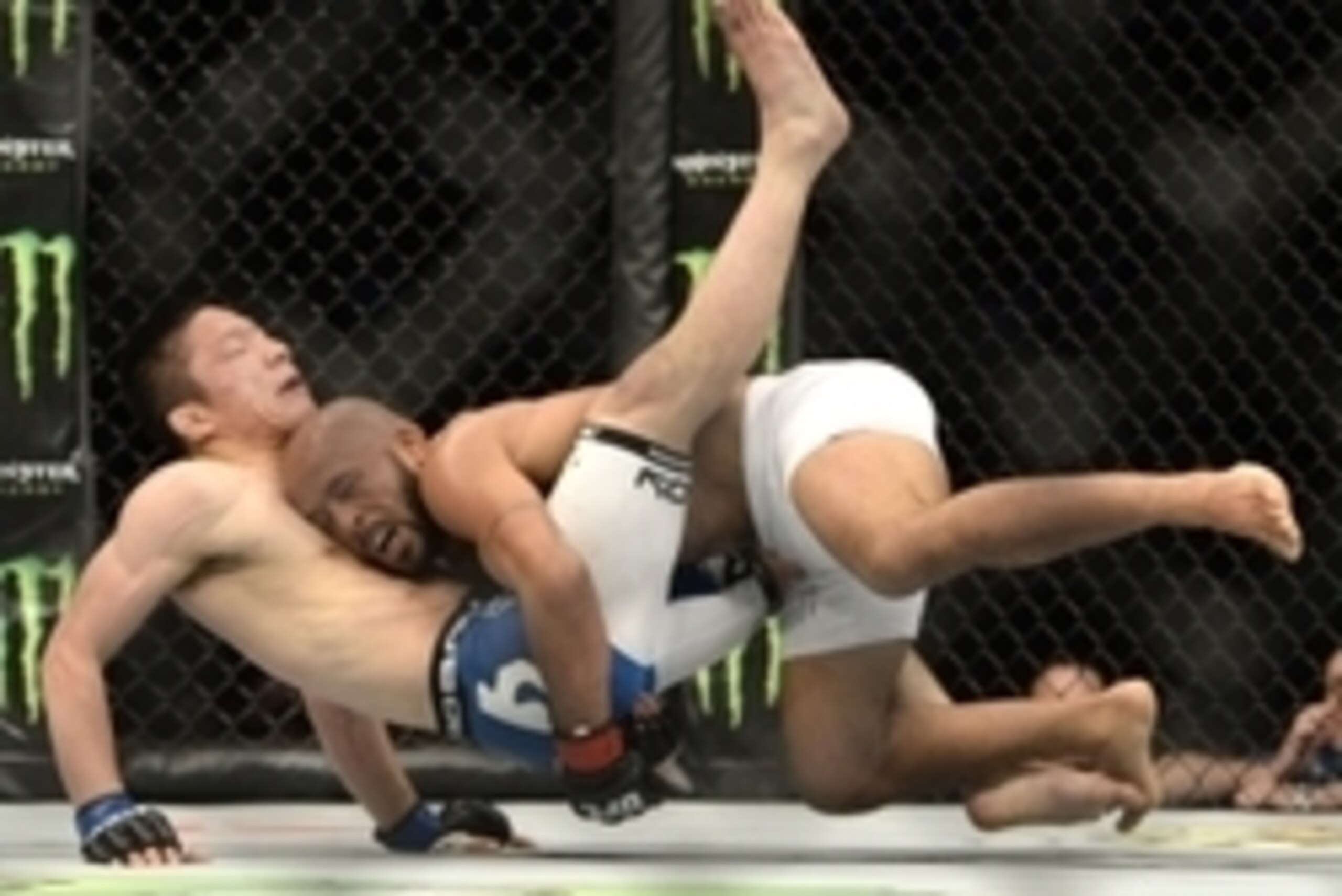 Apr 25, 2015; Montreal, Quebec, CAN; Demetrious Johnson (red) and Kyoji Horiguchi (blue) fight during their flyweight bout during UFC 186 at Bell Centre. Mandatory Credit: Eric Bolte-USA TODAY Sports Apr 25, 2015; Montreal, Quebec, CAN; Demetrious Johnson (red) and Kyoji Horiguchi (blue) fight during their flyweight bout during UFC 186 at Bell Centre. Mandatory Credit: Eric Bolte-USA TODAY Sports