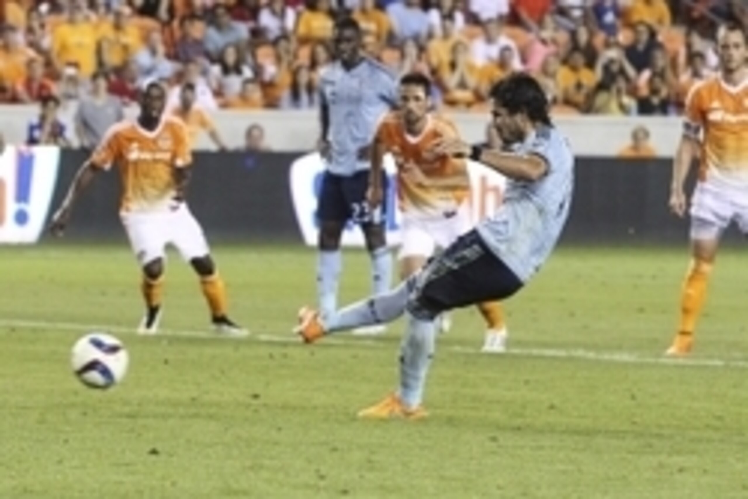 Apr 25, 2015; Houston, TX, USA; Sporting KC midfielder Benny Feilhaber (10) scores a goal on a penalty kick during the second half against the Houston Dynamo at BBVA Compass Stadium. The Dynamo and Sporting KC played to a 4-4 tie. Mandatory Credit: Troy T Apr 25, 2015; Houston, TX, USA; Sporting KC midfielder Benny Feilhaber (10) scores a goal on a penalty kick during the second half against the Houston Dynamo at BBVA Compass Stadium. The Dynamo and Sporting KC played to a 4-4 tie. Mandatory Credit: Troy T