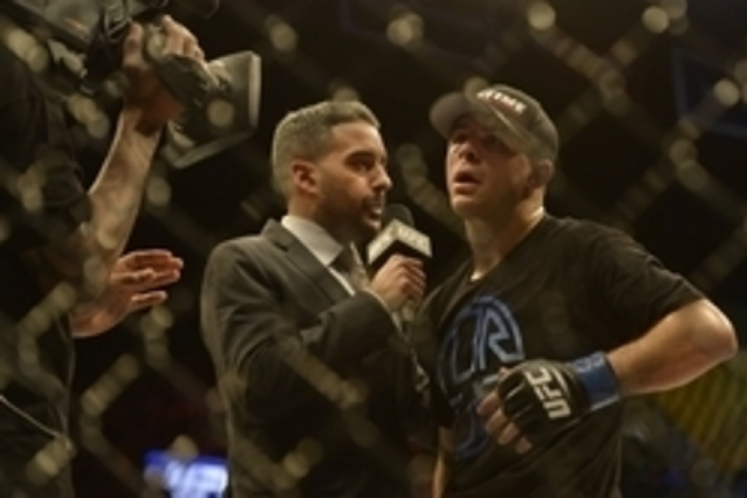 Apr 4, 2015; Fairfax, VA, USA; Al Iaquinta (blue gloves) speaks to the media after defeating Jorge Masvidal (not pictured) during UFC Fight Night at Patriot Center. Mandatory Credit: Tommy Gilligan-USA TODAY Sports Apr 4, 2015; Fairfax, VA, USA; Al Iaquinta (blue gloves) speaks to the media after defeating Jorge Masvidal (not pictured) during UFC Fight Night at Patriot Center. Mandatory Credit: Tommy Gilligan-USA TODAY Sports
