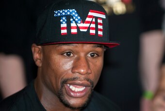 Apr 14, 2015; Las Vegas, NV, USA; Floyd Mayweather Jr., answers questions from reporters before training at Mayweather Boxing Club. Mandatory Credit: Stephen R. Sylvanie-USA TODAY Sports