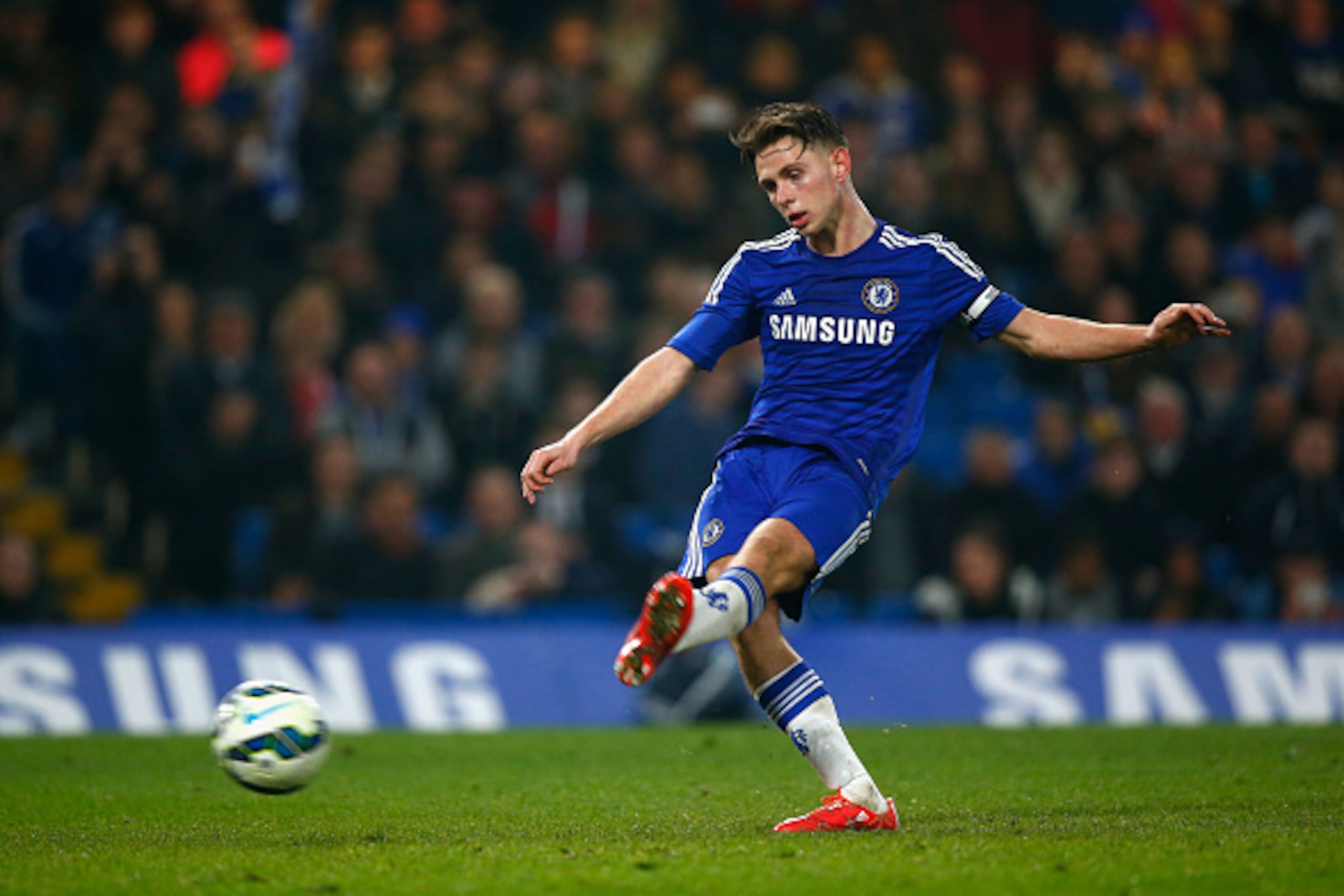 LONDON, ENGLAND - MARCH 18:  Charlie Colkett of Chelsea scores from the penalty spot during the FA Youth Cup Semi Final second leg match between Chelsea and Tottenham Hotspur at Stamford Bridge on March 18, 2015 in London, England.  (Photo by Clive Rose/G