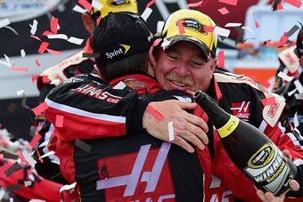 RICHMOND, VA - APRIL 26:  Kurt Busch(left), driver of the #41 Haas Automation Chevrolet, and his crew chief Tony Gibson celebrate in Victory Lane after winning the NASCAR Sprint Cup Series Toyota Owners 400 at Richmond International Raceway on April 26, 2