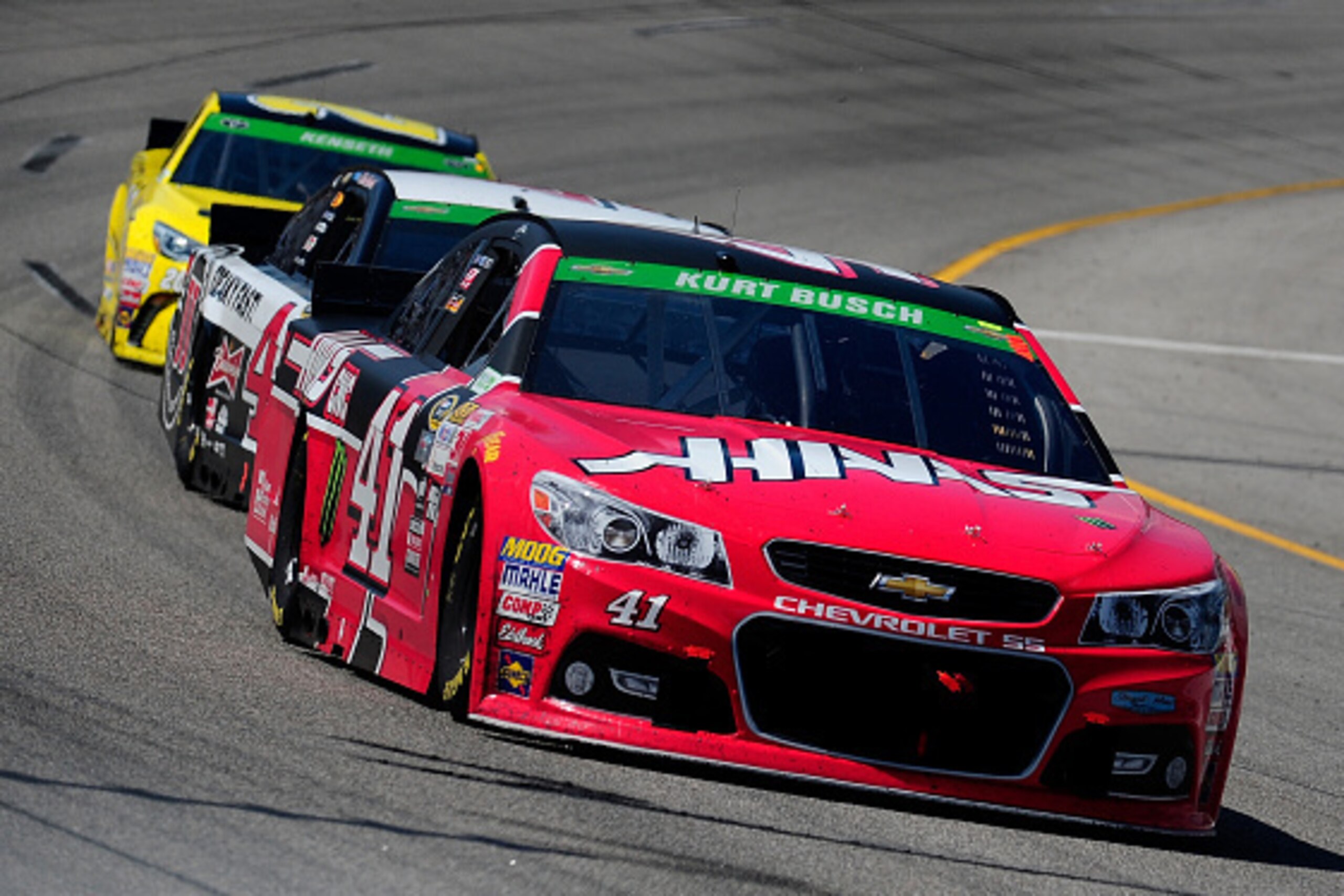 RICHMOND, VA - APRIL 26:  Kurt Busch, driver of the #41 Haas Automation Chevrolet, leads a pack of cars during the NASCAR Sprint Cup Series Toyota Owners 400 at Richmond International Raceway on April 26, 2015 in Richmond, Virginia.  (Photo by Jeff Curry/