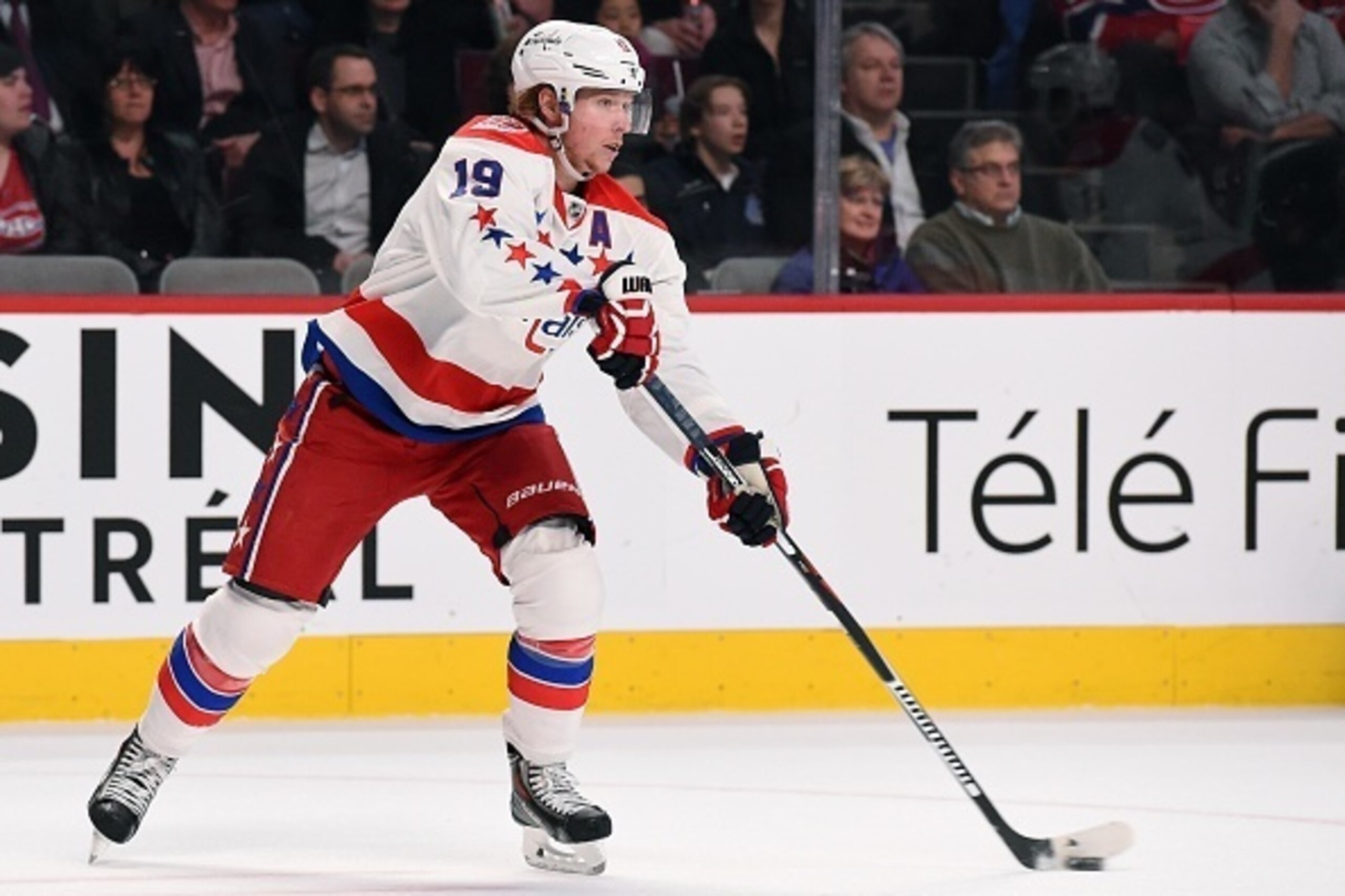 MONTREAL, QC - APRIL 2: Nicklas Backstrom #19 of the Washington Capitals passes the puck against the Montreal Canadiens  in the NHL game at the Bell Centre on April 2, 2015 in Montreal, Quebec, Canada. (Photo by Francois Lacasse/NHLI via Getty Images)