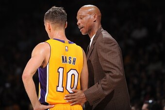 SAN DIEGO, CA- OCTOBER 6: Byron Scott, Head Coach, and Steve Nash #10 of the Los Angeles Lakers speak during a game  against the Denver Nuggets as the Los Angeles Lakers take on the Denver Nuggets at the Valley View Sports Arena in San Diego, California o
