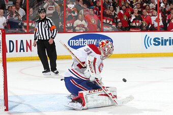 OTTAWA, ON - APRIL 26: Carey Price #31 of the Montreal Canadiens makes one of his forty-three saves against the Ottawa Senators in Game Six of the Eastern Conference Quarterfinals during the 2015 NHL Stanley Cup Playoffs at Canadian Tire Centre on April 2
