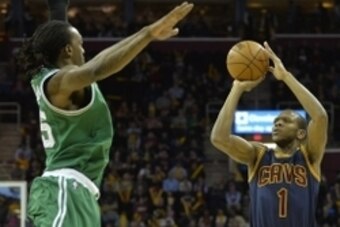 Mar 3, 2015; Cleveland, OH, USA; Cleveland Cavaliers forward James Jones (1) shoots against Boston Celtics forward Gerald Wallace (45) in the third quarter at Quicken Loans Arena. Mandatory Credit: David Richard-USA TODAY Sports