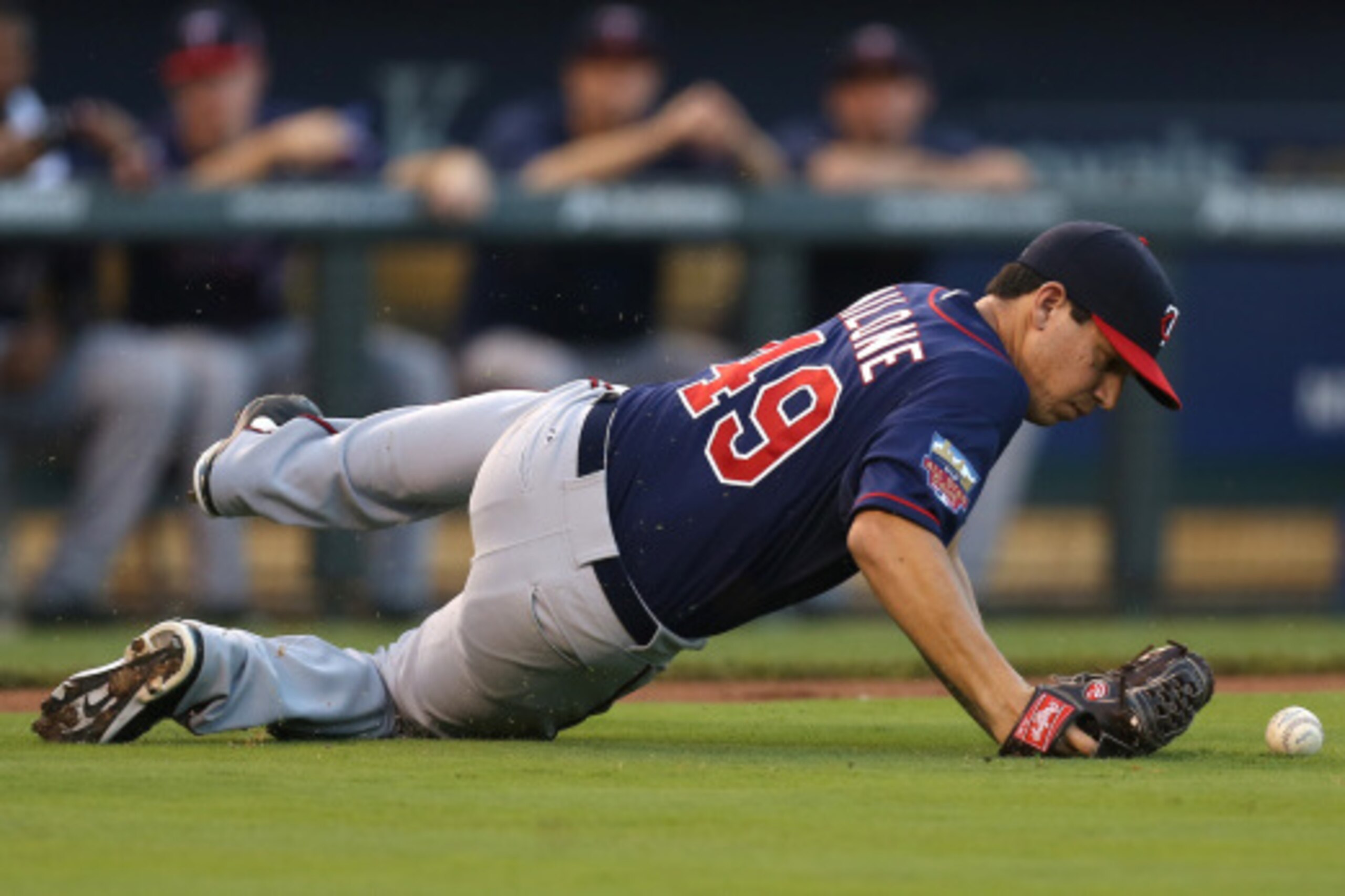 KANSAS CITY, MO - AUGUST 28: Starting pitcher Tommy Milone #49 of the Minnesota Twins chases down a bunted ball by Alcides Escobar of the Kansas City Royals at Kauffman Stadium on August 28, 2014 in Kansas City, Missouri. (Photo by Ed Zurga/Getty Images) KANSAS CITY, MO - AUGUST 28: Starting pitcher Tommy Milone #49 of the Minnesota Twins chases down a bunted ball by Alcides Escobar of the Kansas City Royals at Kauffman Stadium on August 28, 2014 in Kansas City, Missouri. (Photo by Ed Zurga/Getty Images)