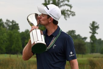 AVONDALE, LA - APRIL 26:  Justin Rose of England poses with the trophy after winning the Zurich Classic of New Orleans at TPC Louisiana on April 26, 2015 in Avondale, Louisiana.  (Photo by Stacy Revere/Getty Images)