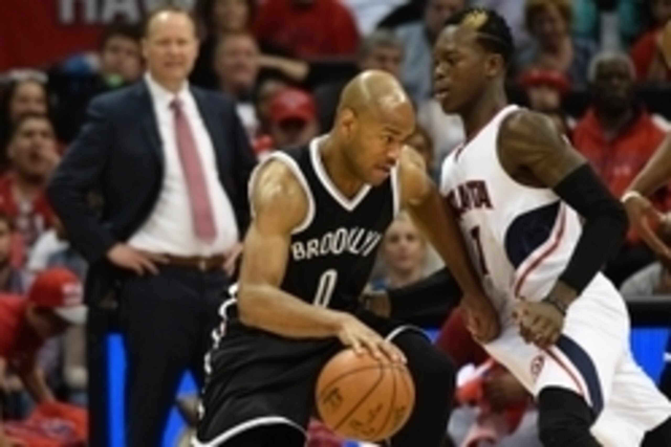 Apr 19, 2015; Atlanta, GA, USA; Brooklyn Nets guard Jarrett Jack (0) works against Atlanta Hawks guard Dennis Schroder (17) during the second half in game one of the first round of the NBA Playoffs at Philips Arena. The Hawks defeated the Nets 99-92. Mand