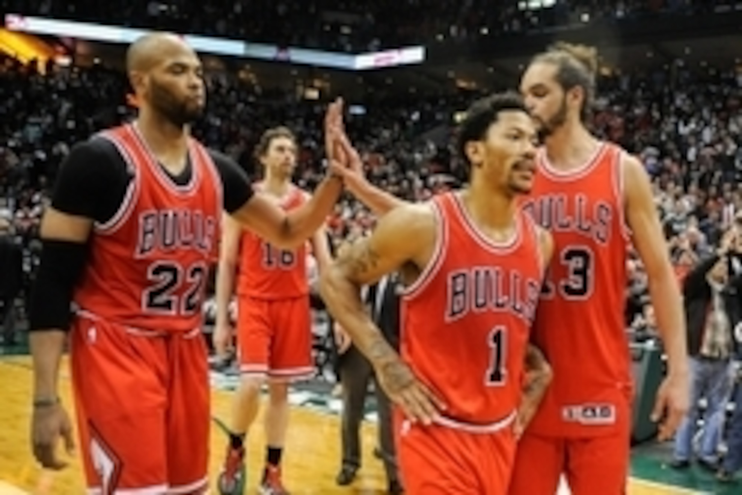 Apr 25, 2015; Milwaukee, WI, USA; Chicago Bulls forward Taj Gibson (22) and guard Derrick Rose (1) and center Joakim Noah (13) walks off the court after the Milwaukee Bucks beat the Bulls 92-90 in game four of the first round of the NBA Playoffs at BMO Ha