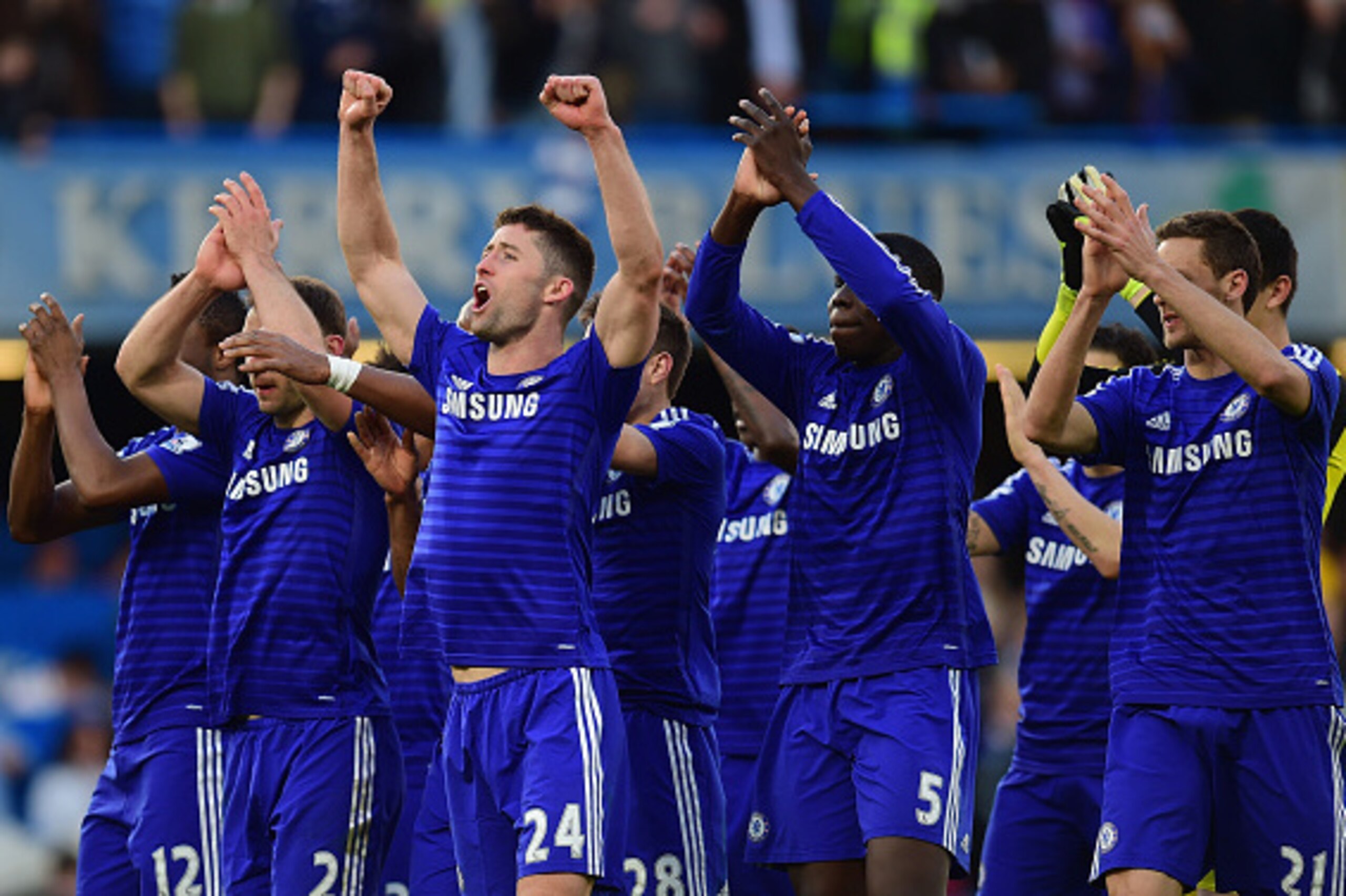 LONDON, ENGLAND - APRIL 18:  Branislav Ivanovic, Gary Cahill and Kurt Zouma of Chelsea celebrate the 1-0 victory after the Barclays Premier League match between Chelsea and Manchester United at Stamford Bridge on April 18, 2015 in London, England.  (Photo