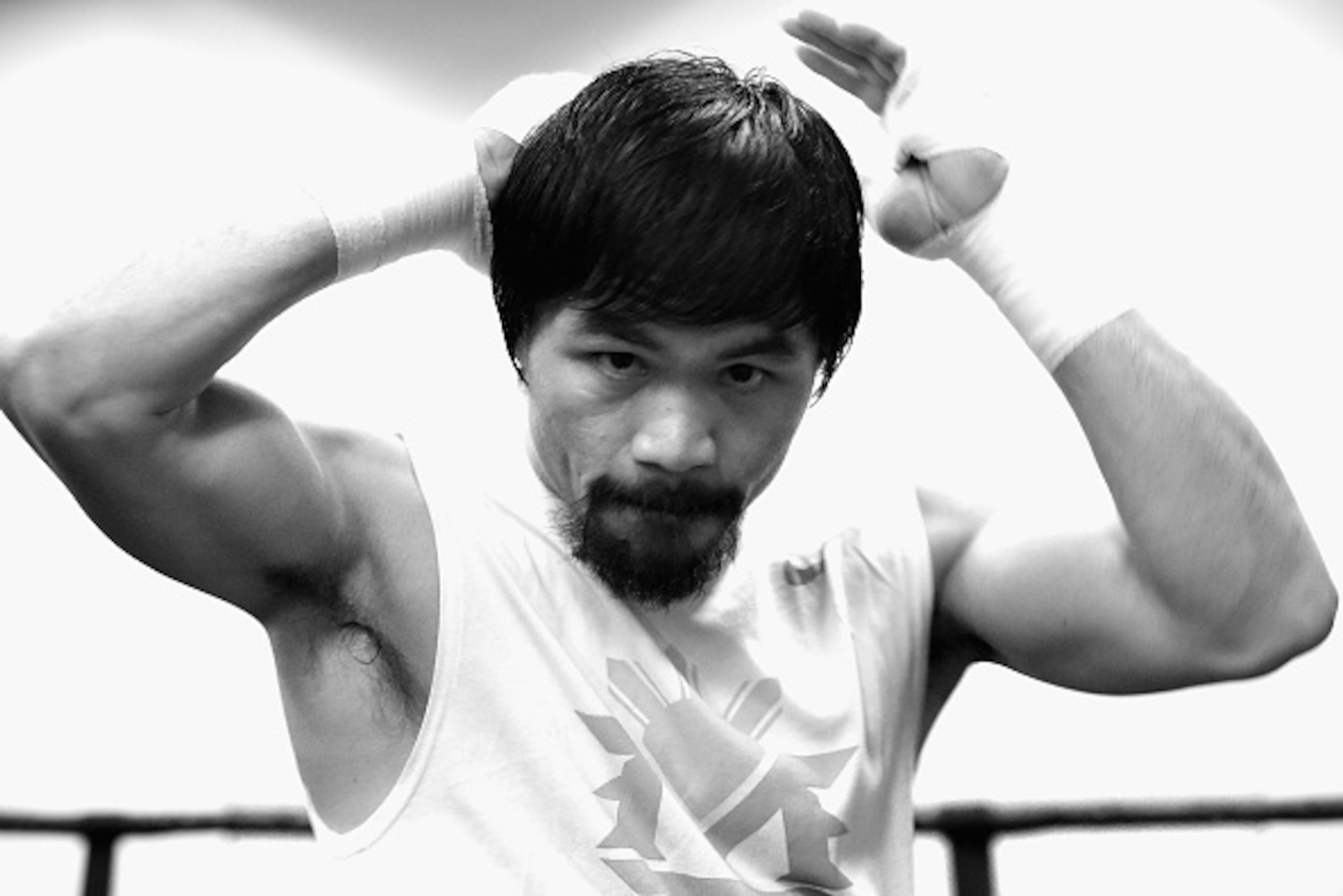 LOS ANGELES, CA - APRIL 13:  (EDITOR'S NOTE: Image has been converted to black and white.) Manny Pacquiao trains in preparation for his fight against Floyd Mayweather Jr. at the Wild Card Boxing Club on April 13, 2015 in Los Angeles, California.  (Photo b