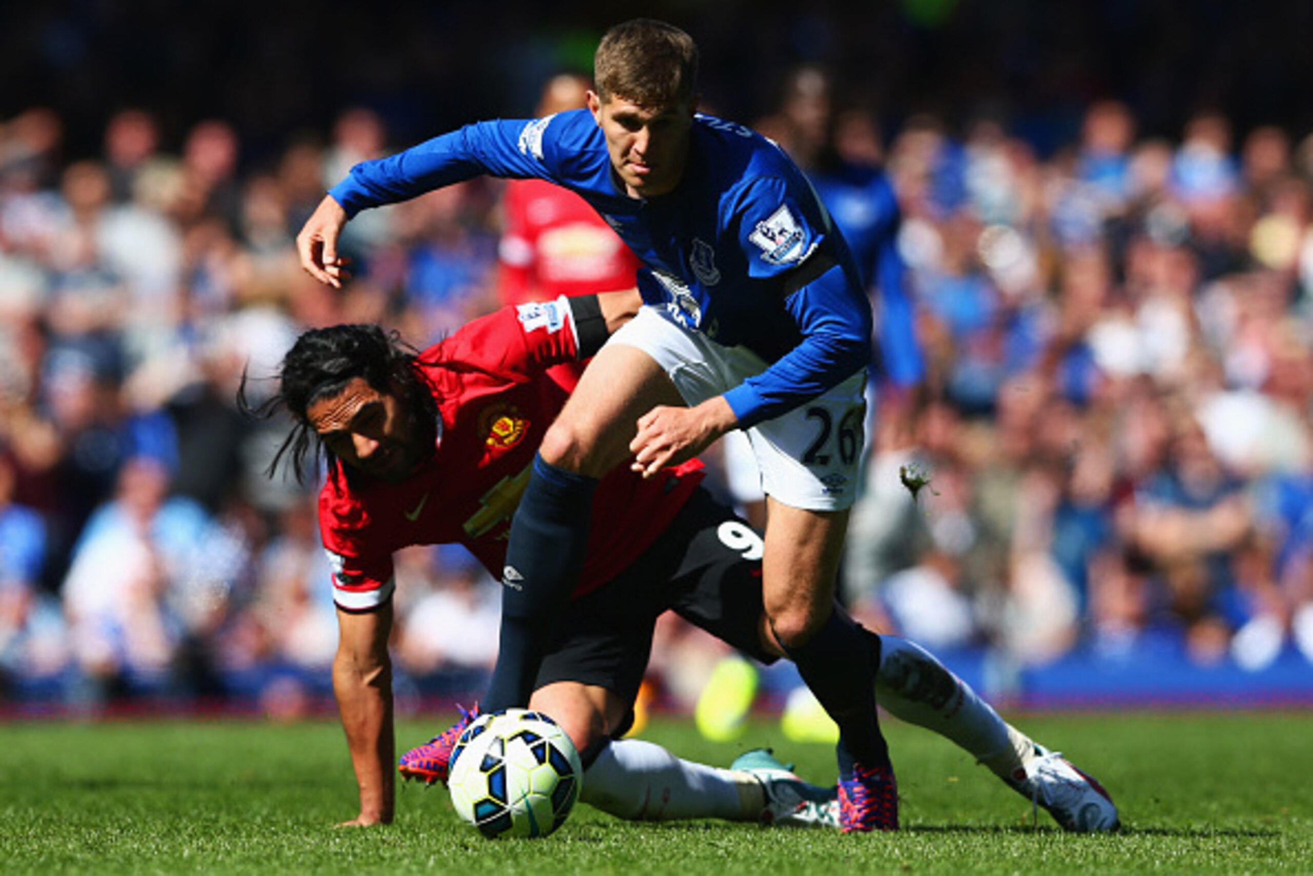 LIVERPOOL, ENGLAND - APRIL 26: John Stones of Everton battles with Radamel Falcao Garcia of Manchester United during the Barclays Premier League match between Everton and Manchester United at Goodison Park on April 26, 2015 in Liverpool, England. (Photo LIVERPOOL, ENGLAND - APRIL 26: John Stones of Everton battles with Radamel Falcao Garcia of Manchester United during the Barclays Premier League match between Everton and Manchester United at Goodison Park on April 26, 2015 in Liverpool, England. (Photo