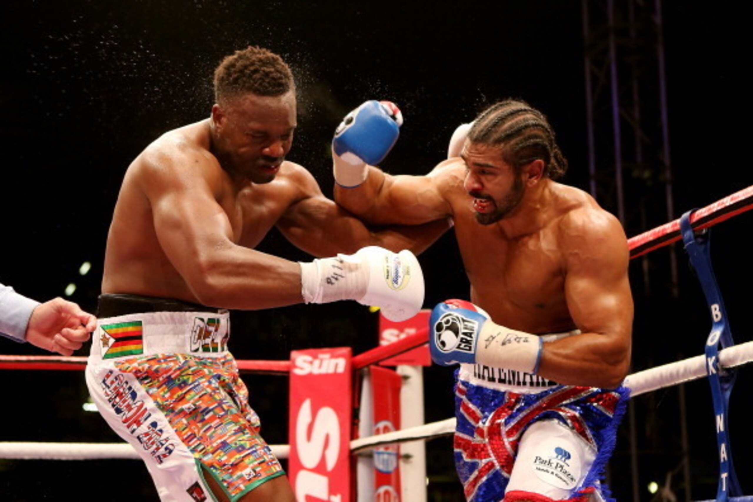 LONDON, ENGLAND - JULY 14:  David Haye (R) in action with Dereck Chisora during their vacant WBO and WBA International Heavyweight Championship bout on July 14, 2012 in London, England.  (Photo by Scott Heavey/Getty Images)