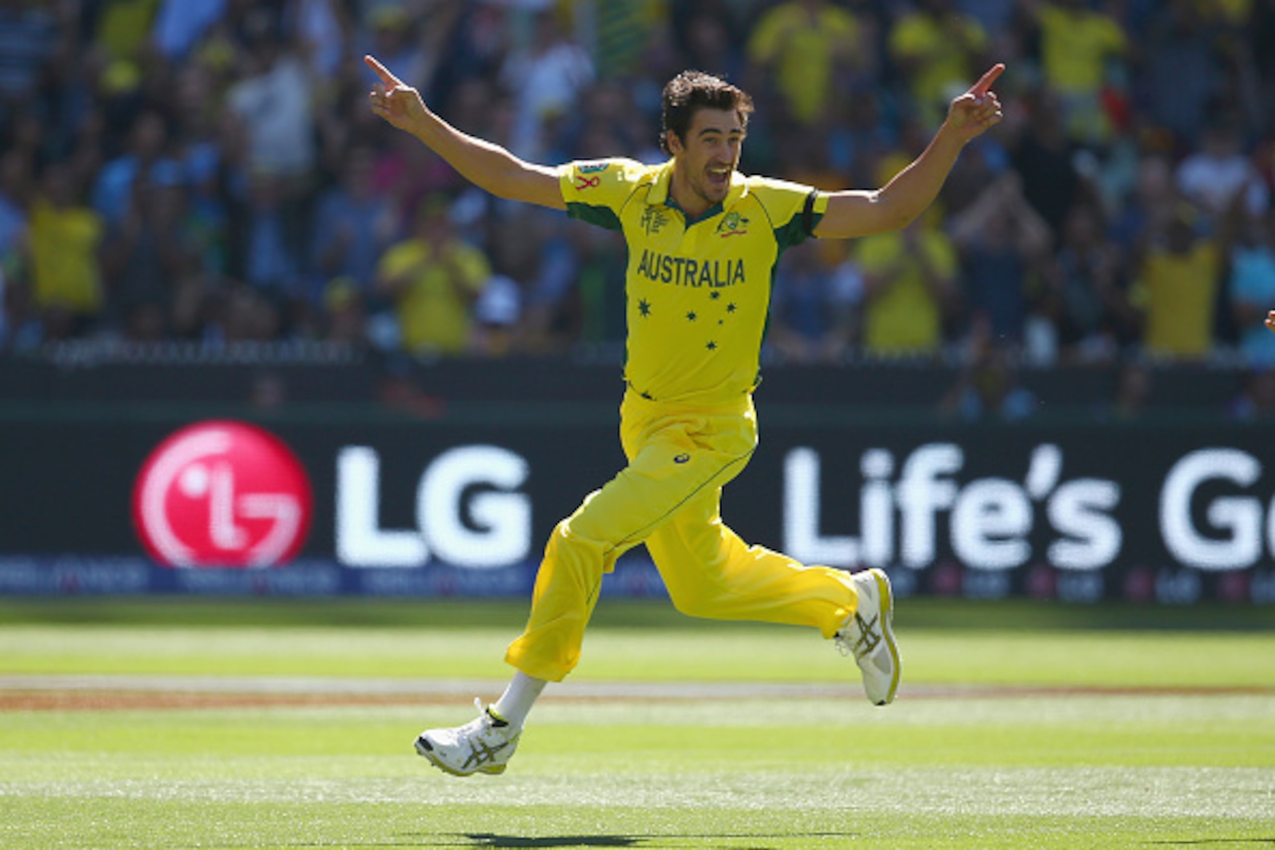 MELBOURNE, AUSTRALIA - MARCH 29:  Mitchell Starc of Australia celebrates taking the wicket of Brendon McCullum of New Zealand during the 2015 ICC Cricket World Cup final match between Australia and New Zealand at Melbourne Cricket Ground on March 29, 2015