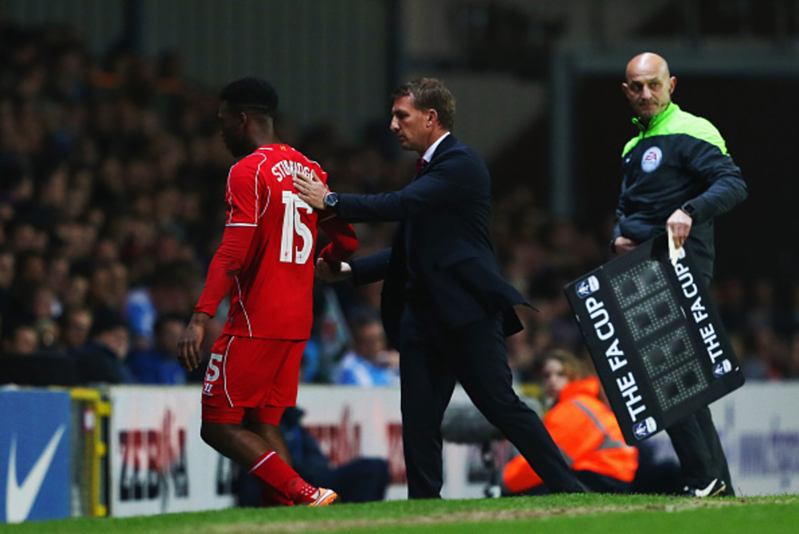 BLACKBURN, ENGLAND - APRIL 08:  Brendan Rodgers manager of Liverpool shakes hands with Daniel Sturridge of Liverpool as he is substituted during the FA Cup Quarter Final Replay match between Blackburn Rovers and Liverpool at Ewood Park on April 8, 2015 in