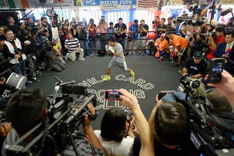 LOS ANGELES, CA - APRIL 15:  Manny Pacquiao spars during a workout in preparation for his fight against Floyd Mayweather Jr. at Wild Card Boxing Club on April 15, 2015 in Los Angeles, California.  (Photo by Harry How/Getty Images)