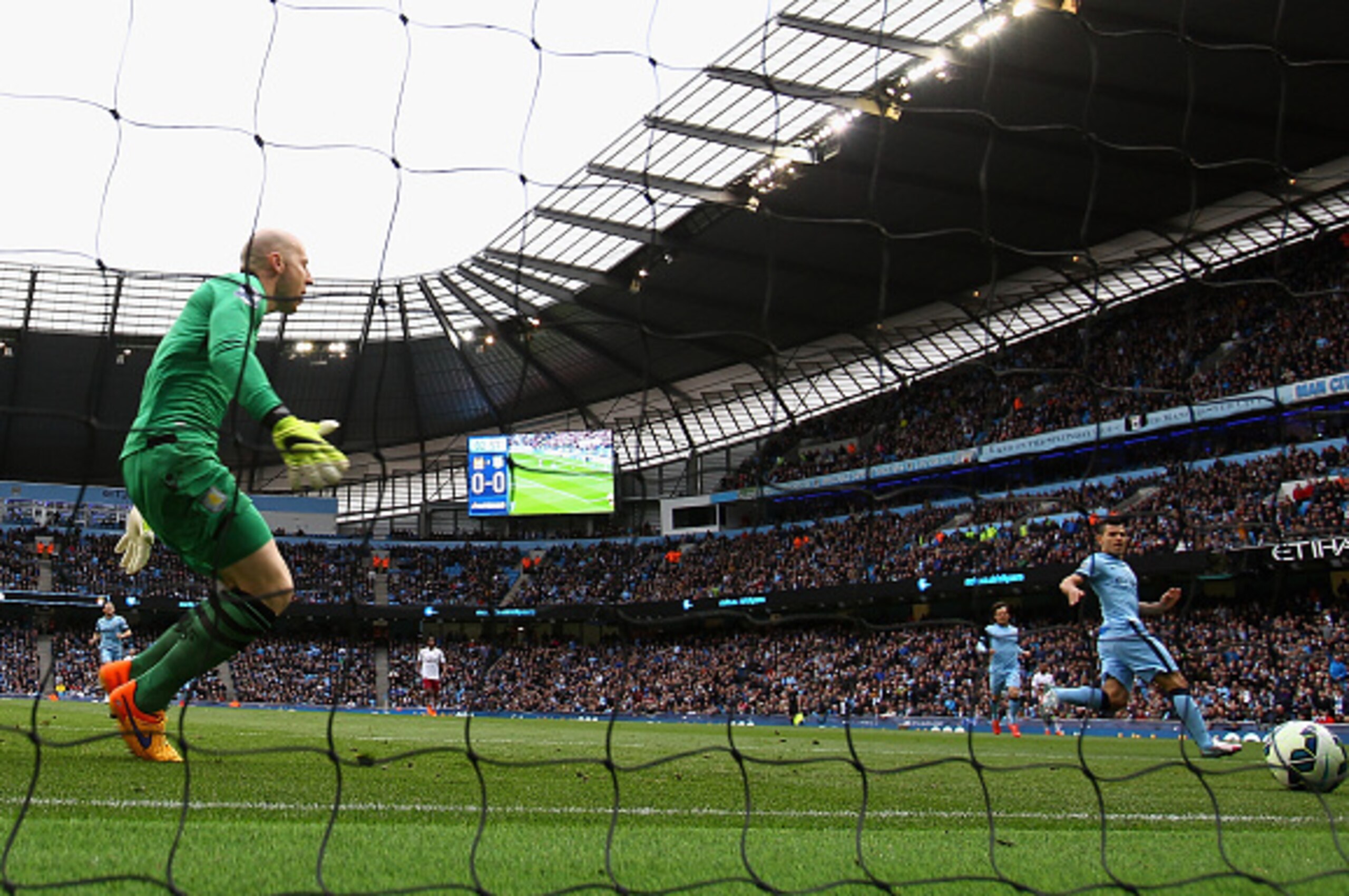 MANCHESTER, ENGLAND - APRIL 25:  Sergio Aguero of Manchester City scores the first goal during the Barclays Premier League match between Manchester City and Aston Villa at Etihad Stadium on April 25, 2015 in Manchester, England.  (Photo by Clive Brunskill