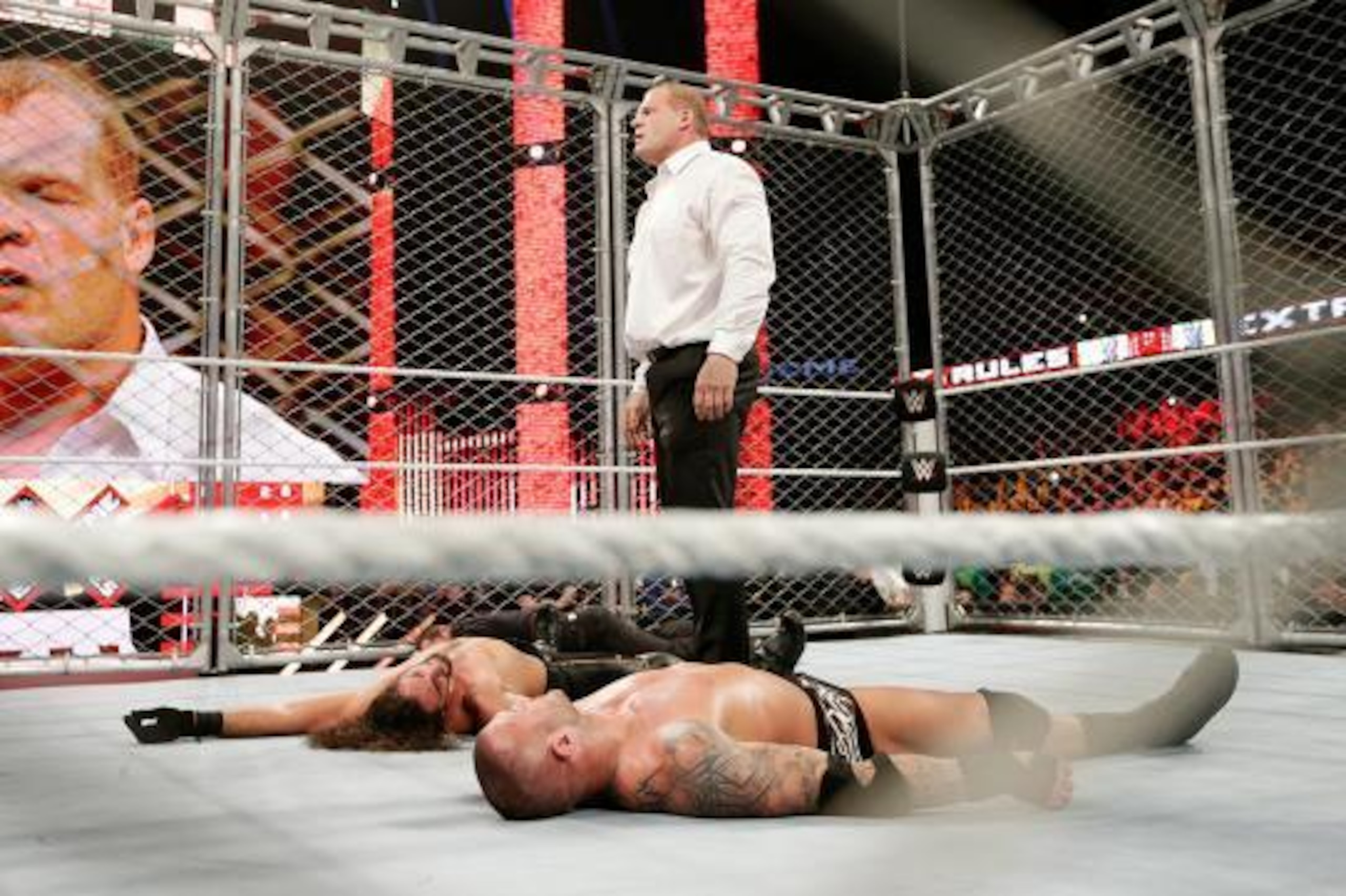 Kane lays out both Seth Rollins and Randy Orton. Kane lays out both Seth Rollins and Randy Orton.