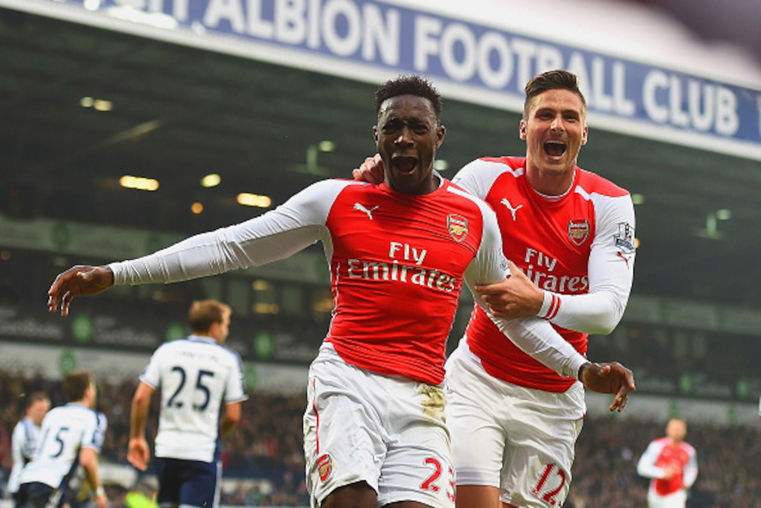 WEST BROMWICH, ENGLAND - NOVEMBER 29:  Danny Welbeck of Arsenal (L) celebrates with team mate Olivier Giroud as he scores their first goal during the Barclays Premier League match between West Bromwich Albion and Arsenal at The Hawthorns on November 29, 2