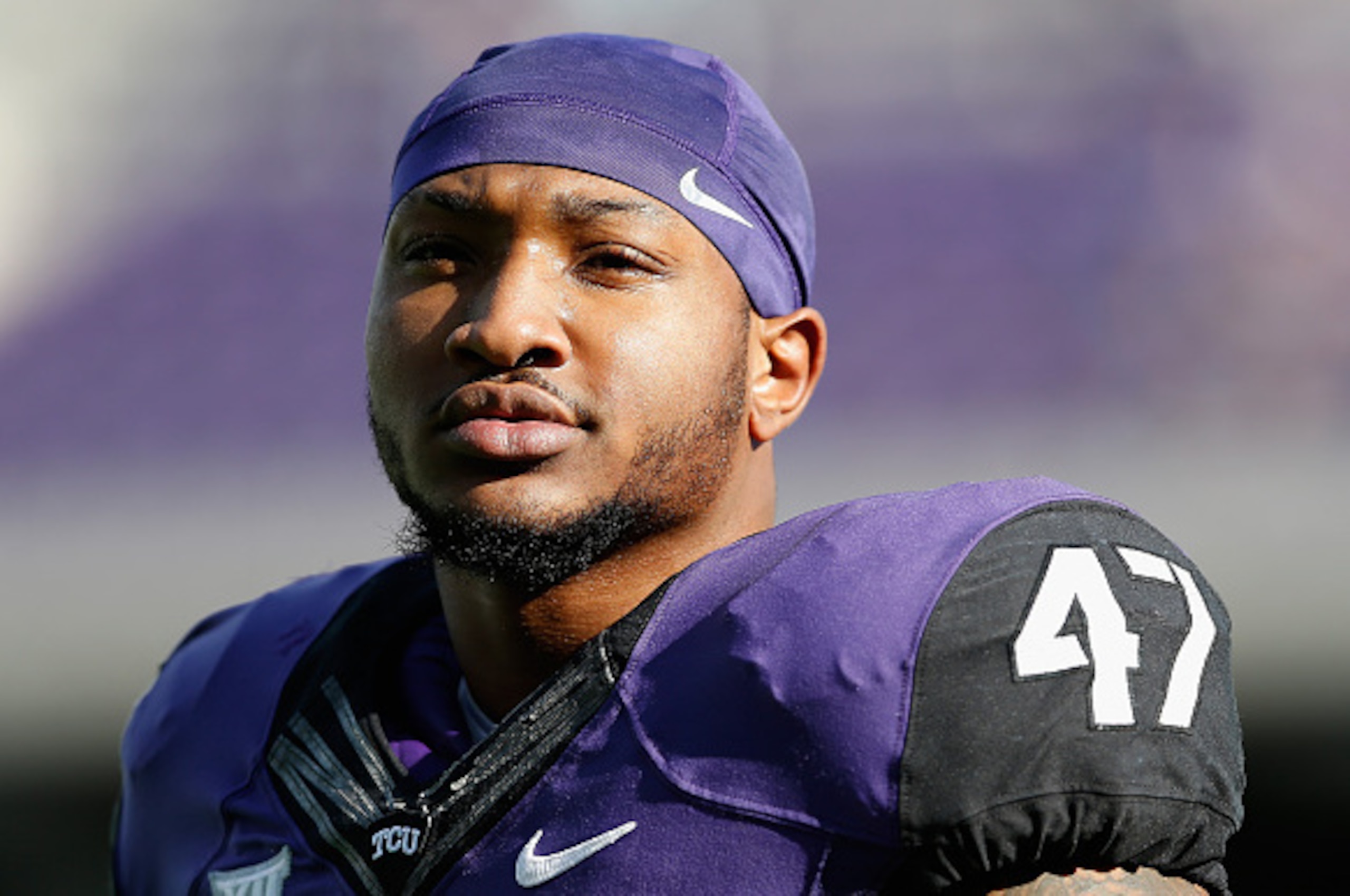 FORT WORTH, TX - DECEMBER 06:  Linebacker Paul Dawson #47 of the TCU Horned Frogs warms up before the Big 12 college football game against the Iowa State Cyclones at Amon G. Carter Stadium on December 6, 2014 in Fort Worth, Texas.  (Photo by Christian Pet