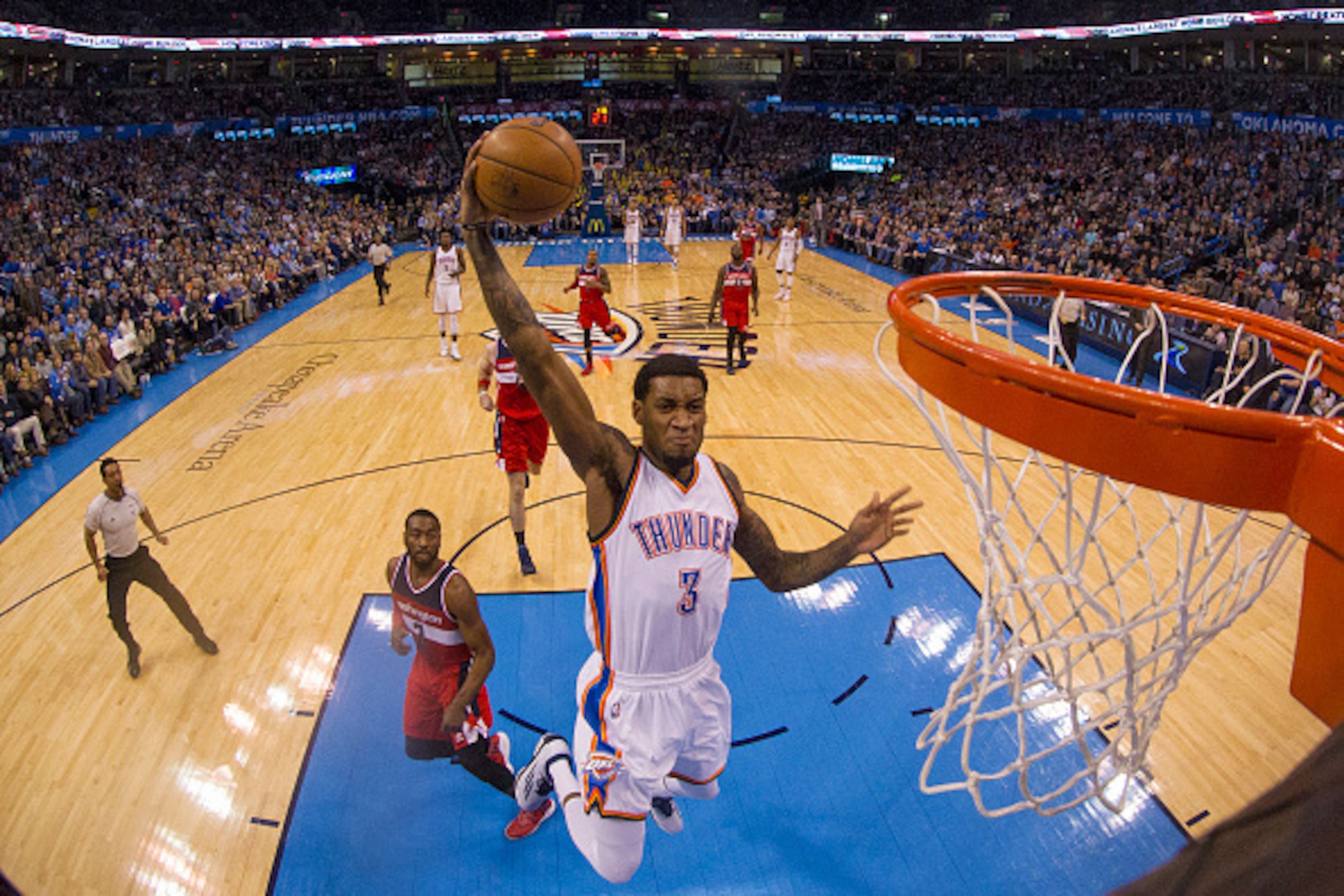 OKLAHOMA CITY, OK - JANUARY 2: Perry Jones #3 of the Oklahoma City Thunder dunks against the Washington Wizards at the Chesapeake Energy Arena on January 2, 2015 in Oklahoma City, Oklahoma. NOTE TO USER: User expressly acknowledges and agrees that, by d OKLAHOMA CITY, OK - JANUARY 2: Perry Jones #3 of the Oklahoma City Thunder dunks against the Washington Wizards at the Chesapeake Energy Arena on January 2, 2015 in Oklahoma City, Oklahoma. NOTE TO USER: User expressly acknowledges and agrees that, by d